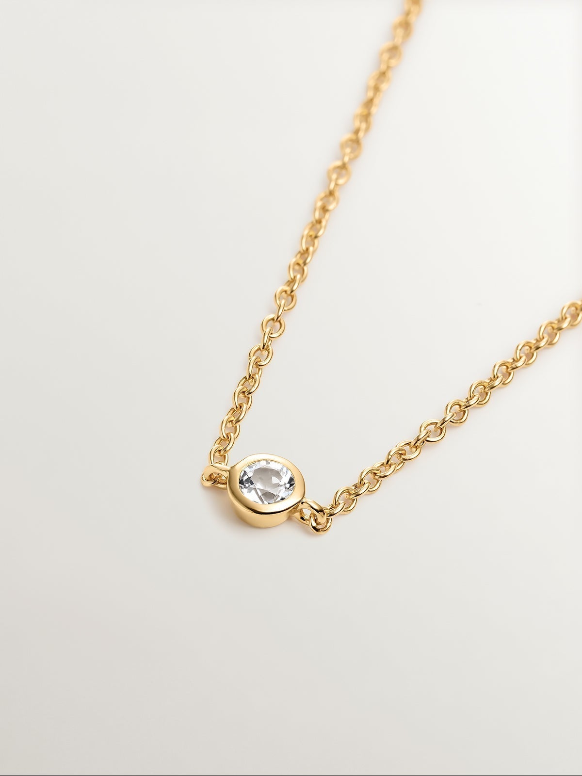 18K yellow gold plated 925 silver solitaire bracelet with white topaz.