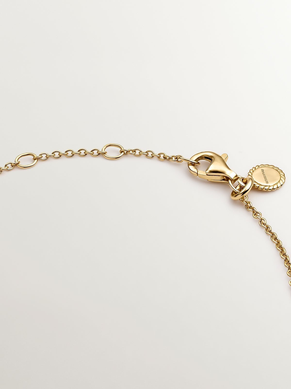 18K yellow gold plated 925 silver solitaire bracelet with white topaz.