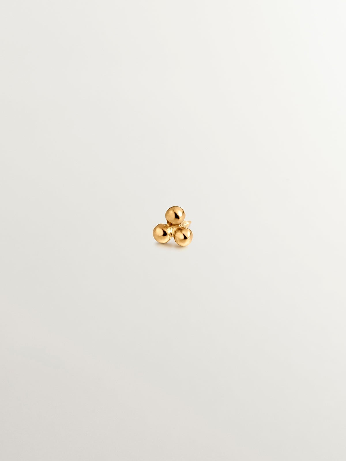 18K yellow gold piercing with triple bead