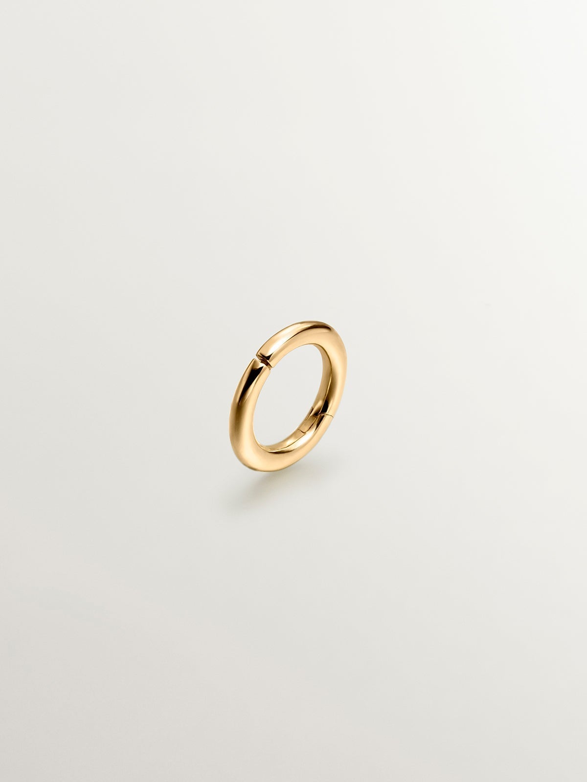 Small individual 9K yellow gold hoop earring.