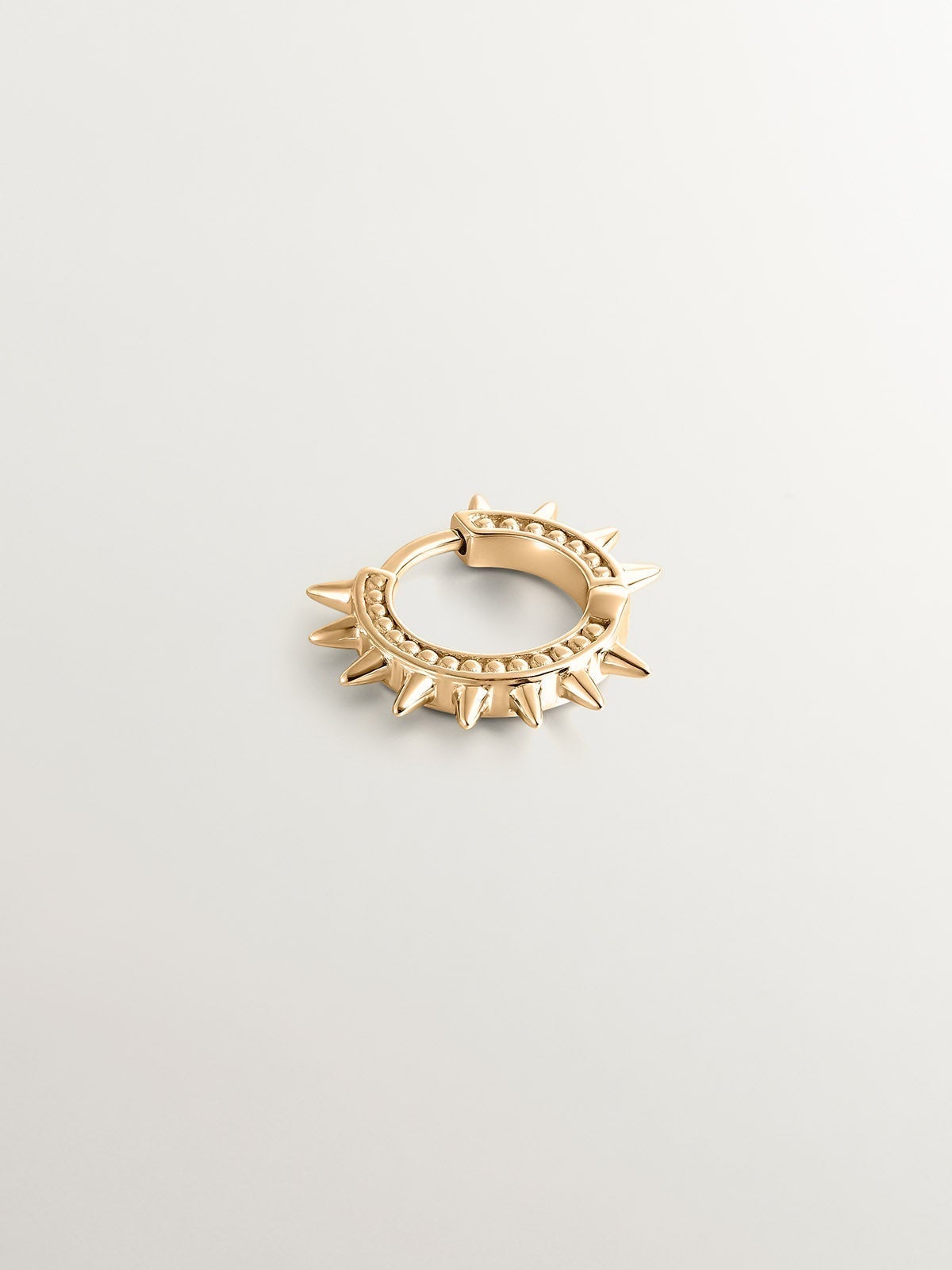 Single 9K yellow gold hoop earring with spikes and spheres