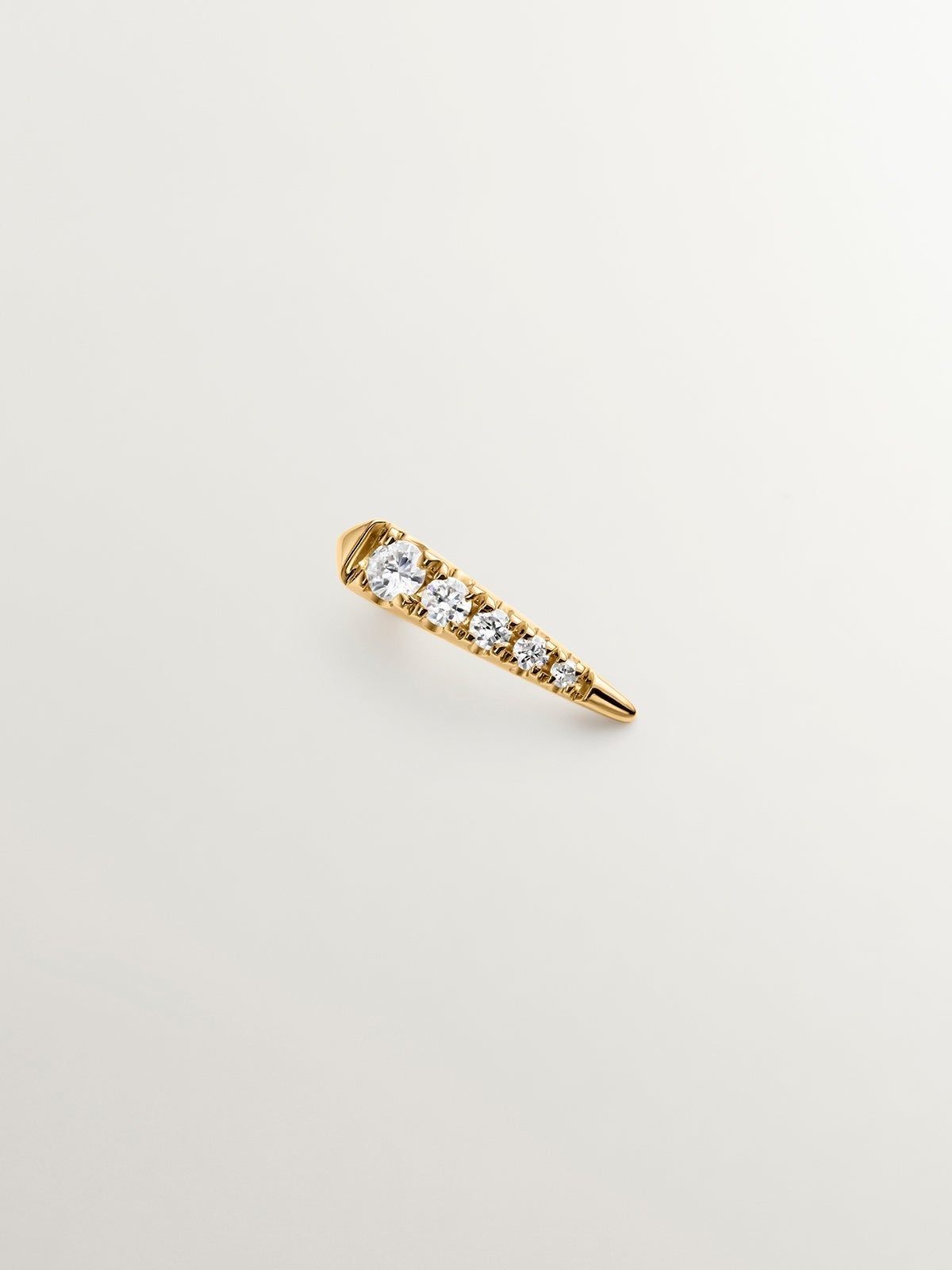 Individual 18K yellow gold earring with diamonds