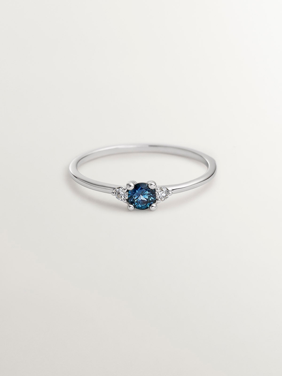 9K White Gold Ring with Blue Sapphire and Diamonds