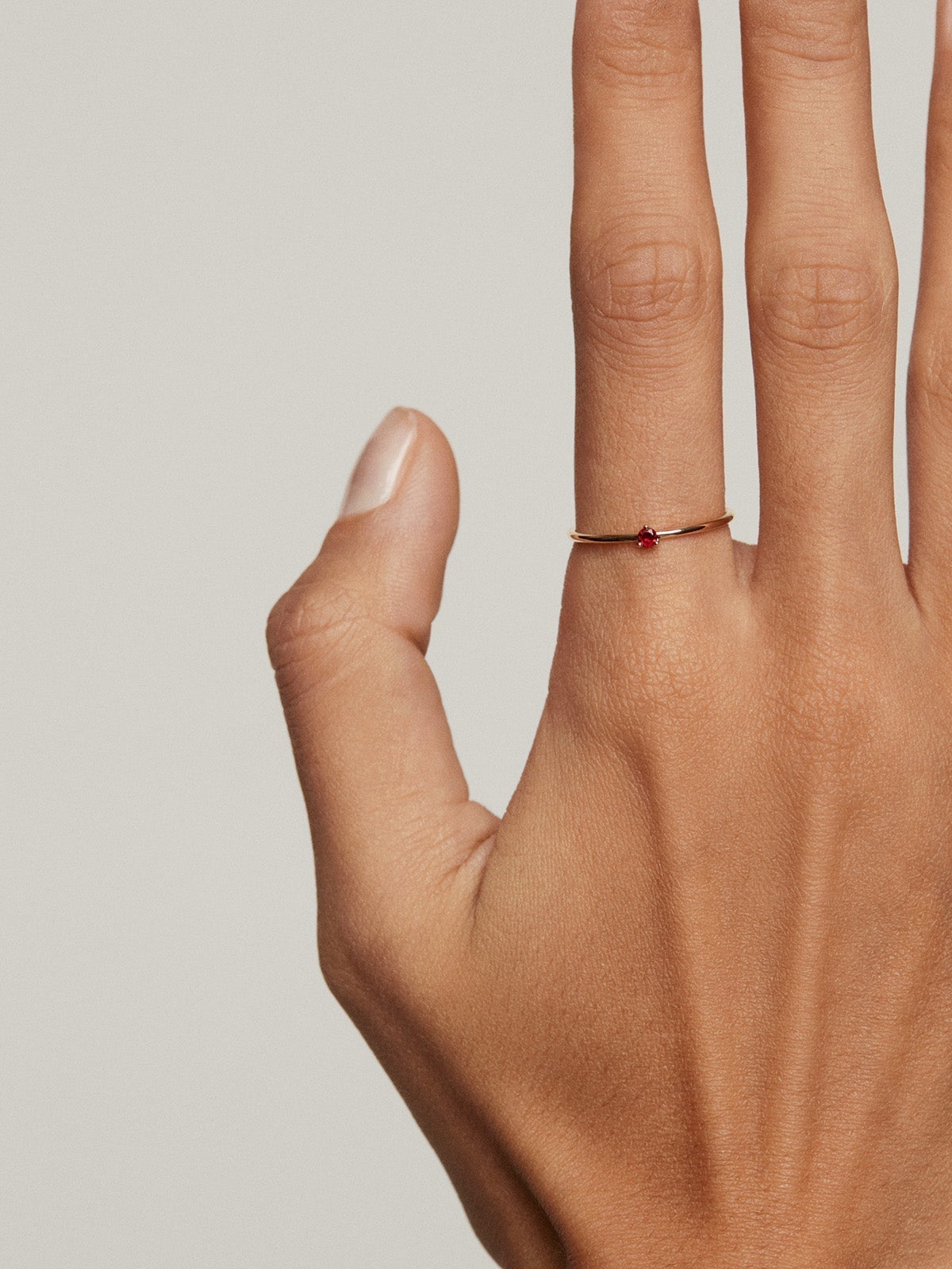 9K yellow gold solitaire ring with red ruby