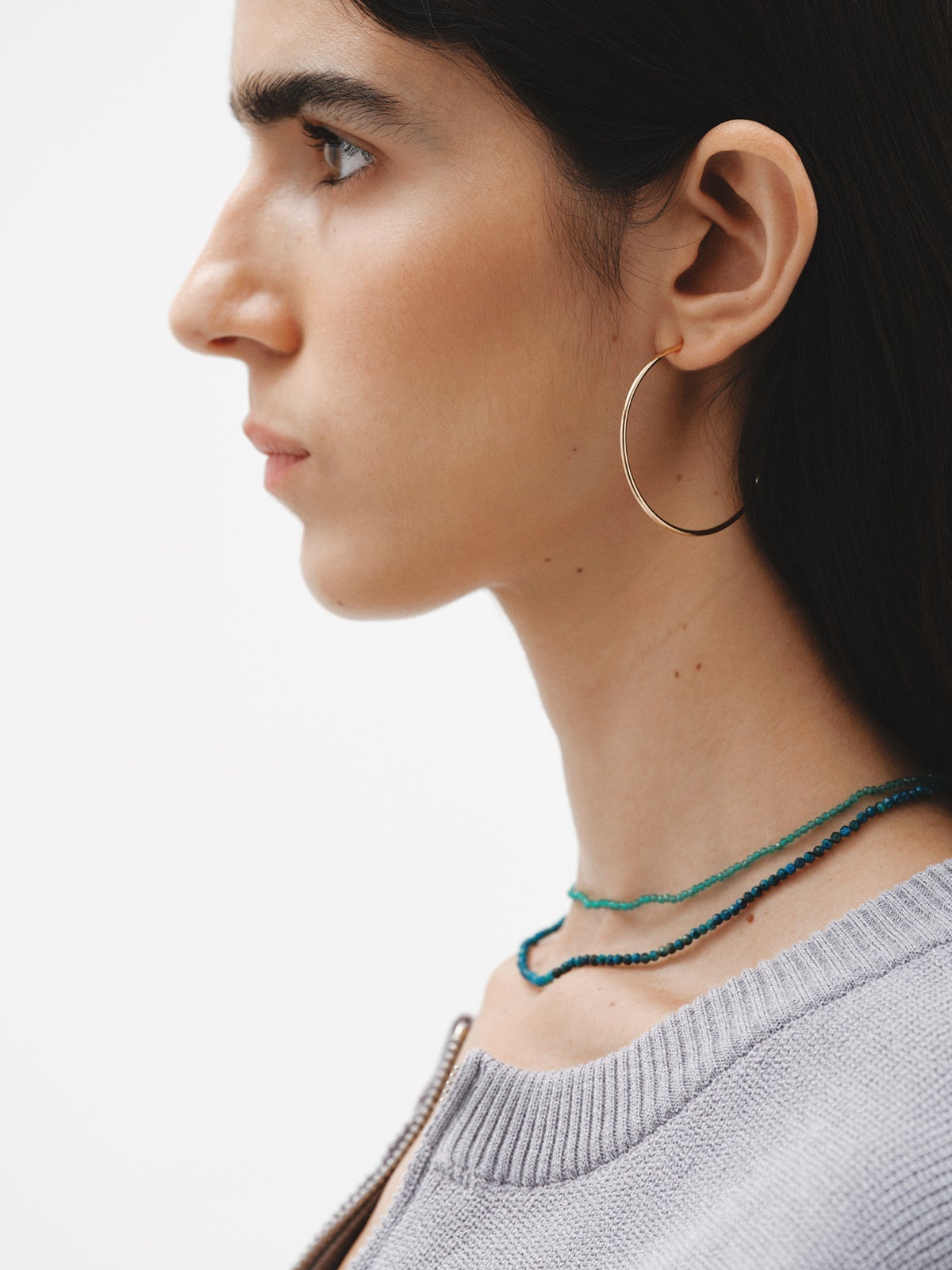 Large hoop earrings made of 925 silver coated in 18K yellow gold.