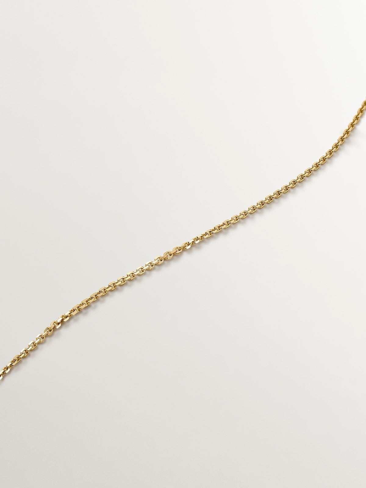 925 Silver pendant bathed in 18K yellow gold with medal and white topaz.