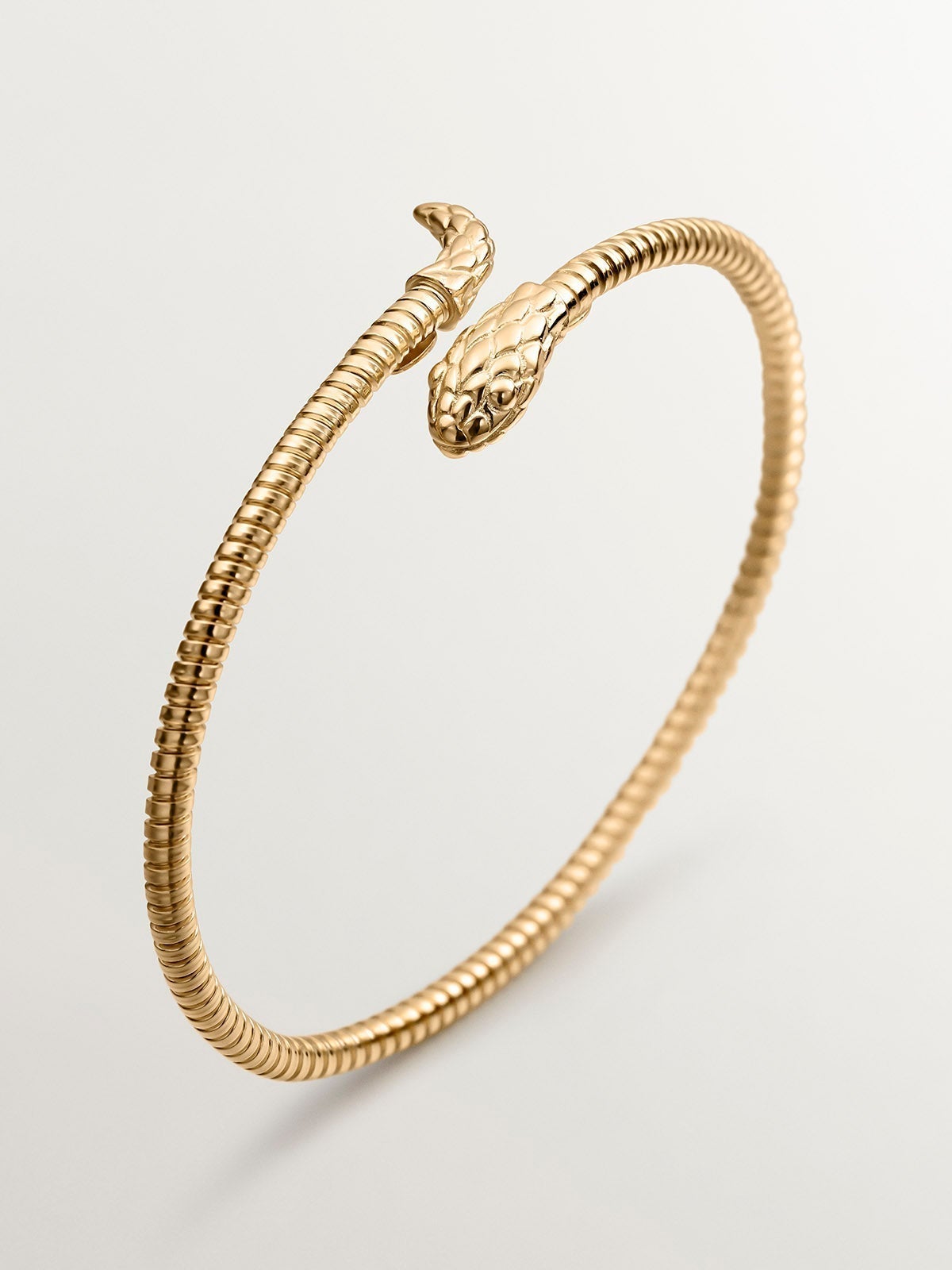 925 Silver bracelet bathed in 18K yellow gold with a snake design.