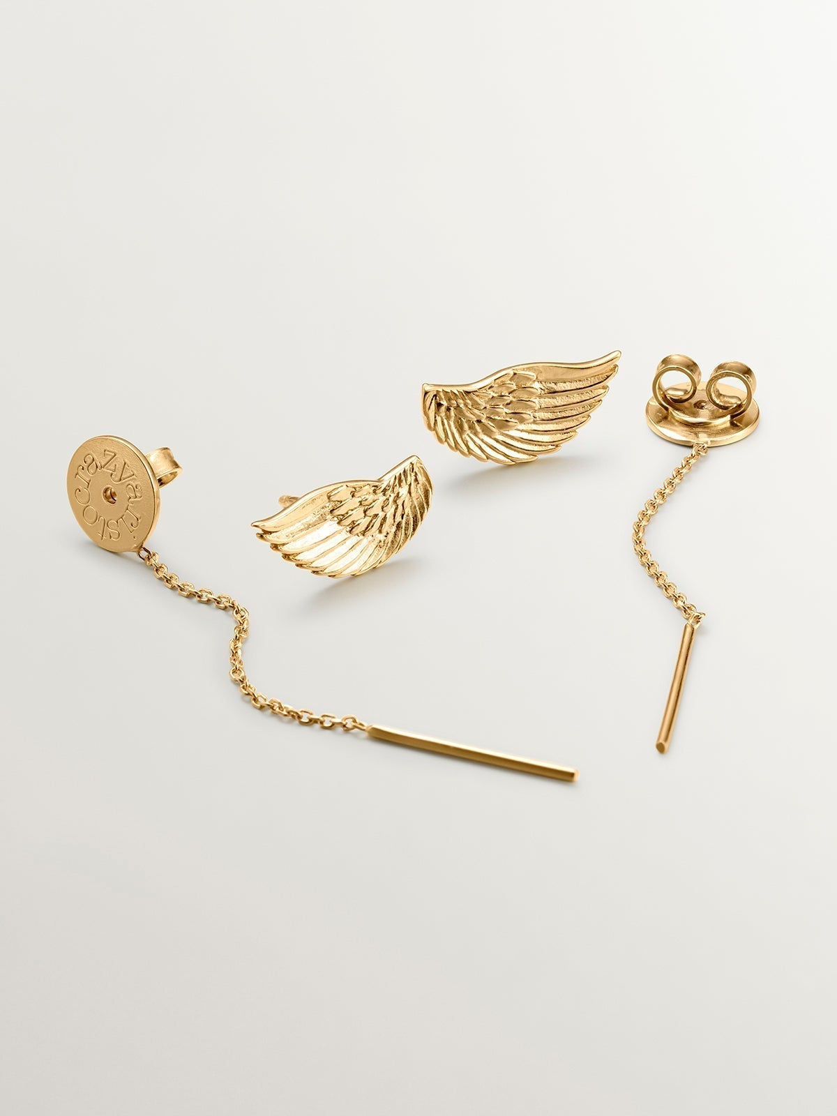 Long 925 silver earrings bathed in 18K yellow gold with wings