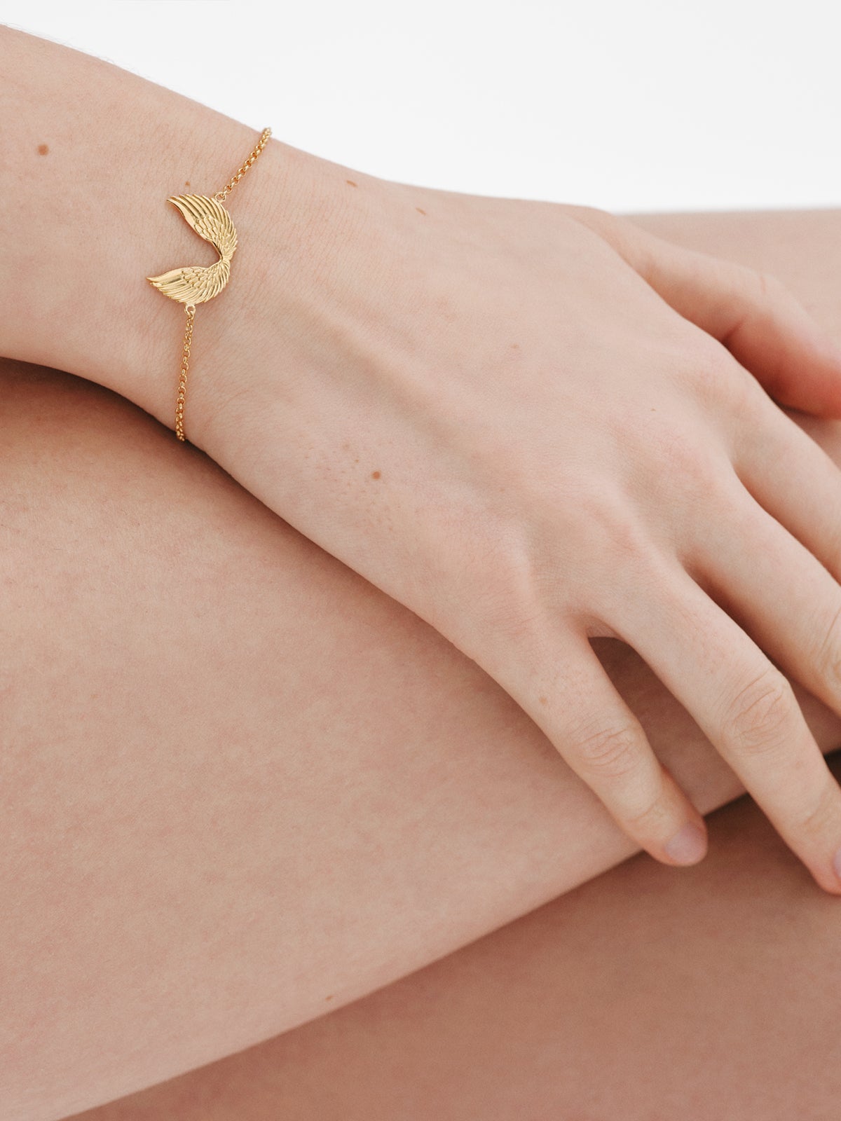 925 Silver bracelet plated in 18K yellow gold with wings