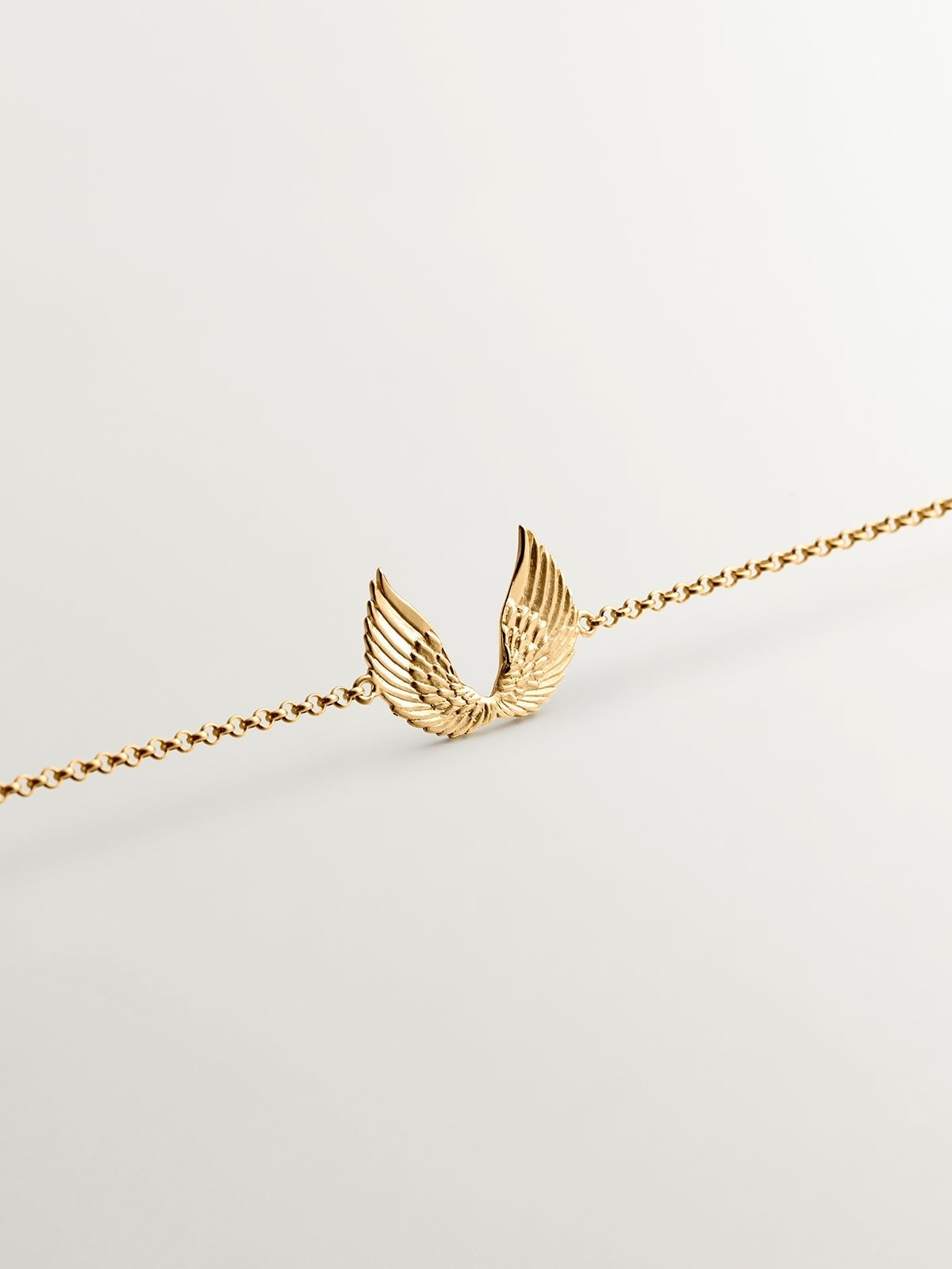 925 Silver bracelet plated in 18K yellow gold with wings