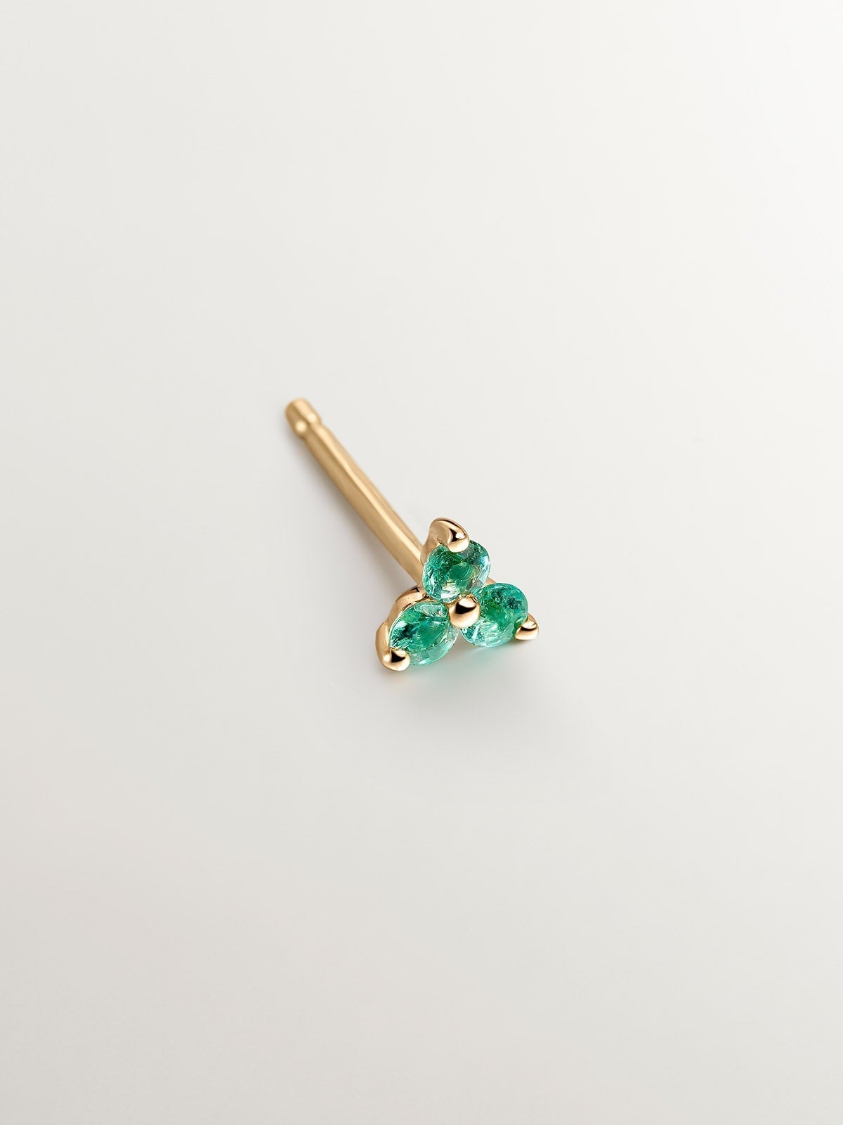Individual 9K yellow gold earring with emerald clover