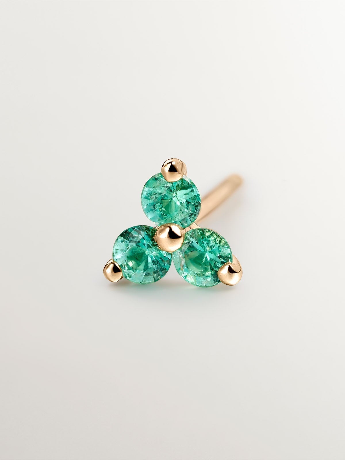 Individual 9K yellow gold earring with emerald clover