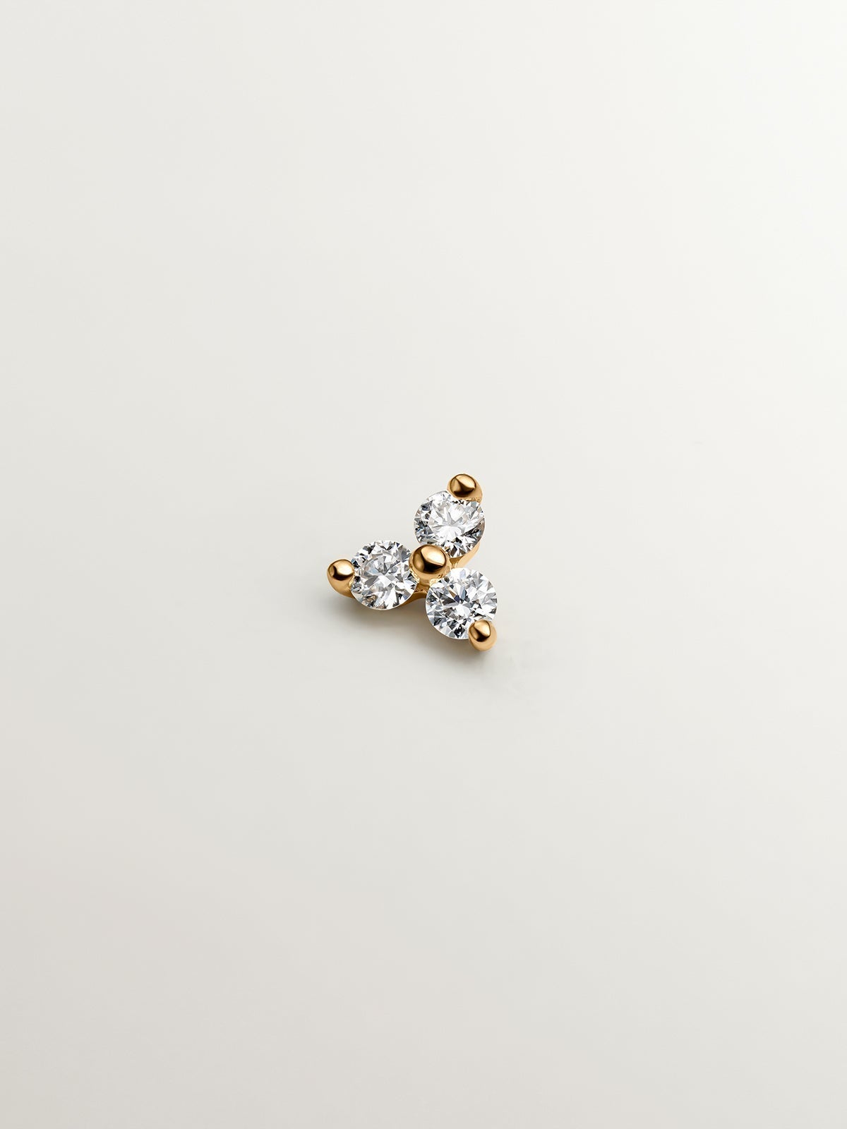 18K yellow gold piercing with 0.06 cts diamond clover