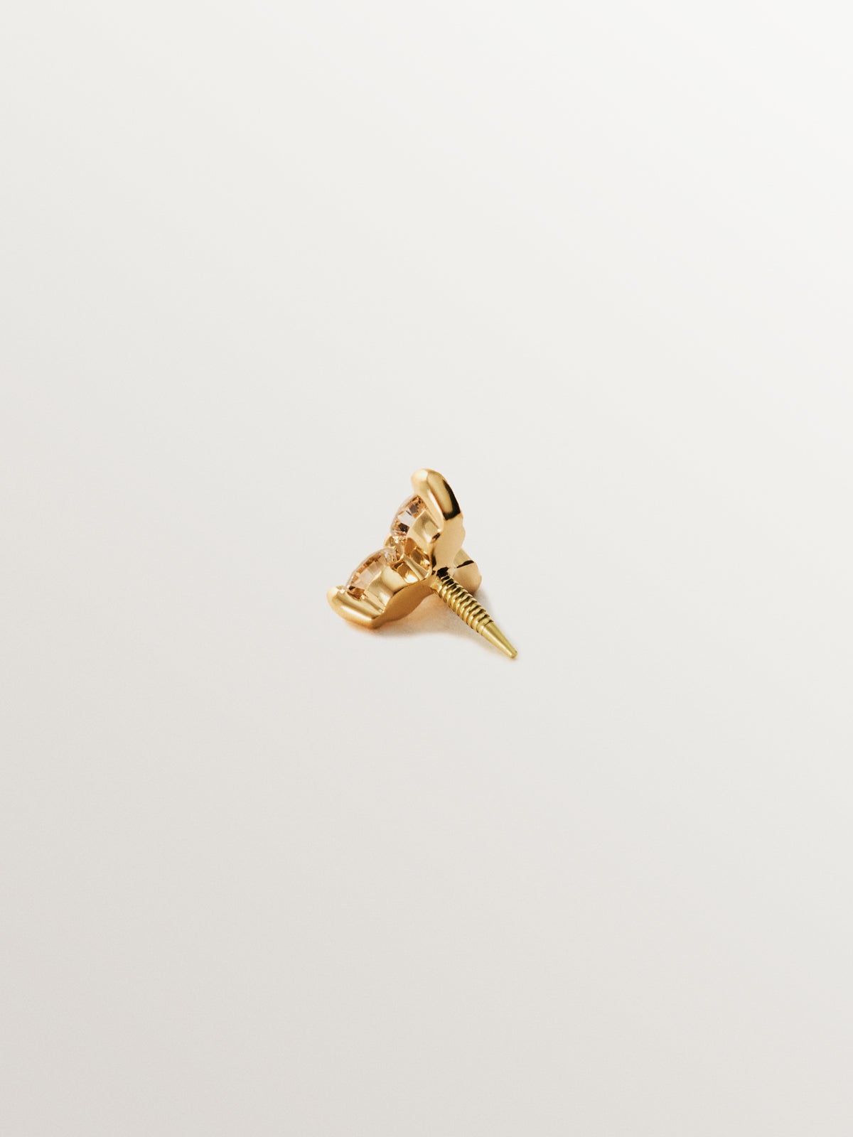 18K yellow gold piercing with 0.06 cts diamond clover