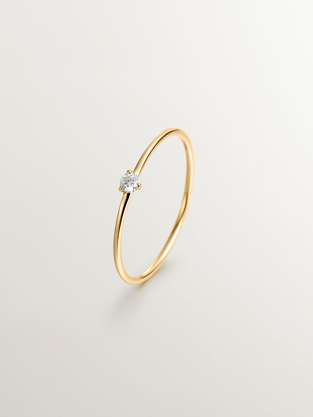 18K yellow gold solitaire ring with 0.048cts ISI2 diamond