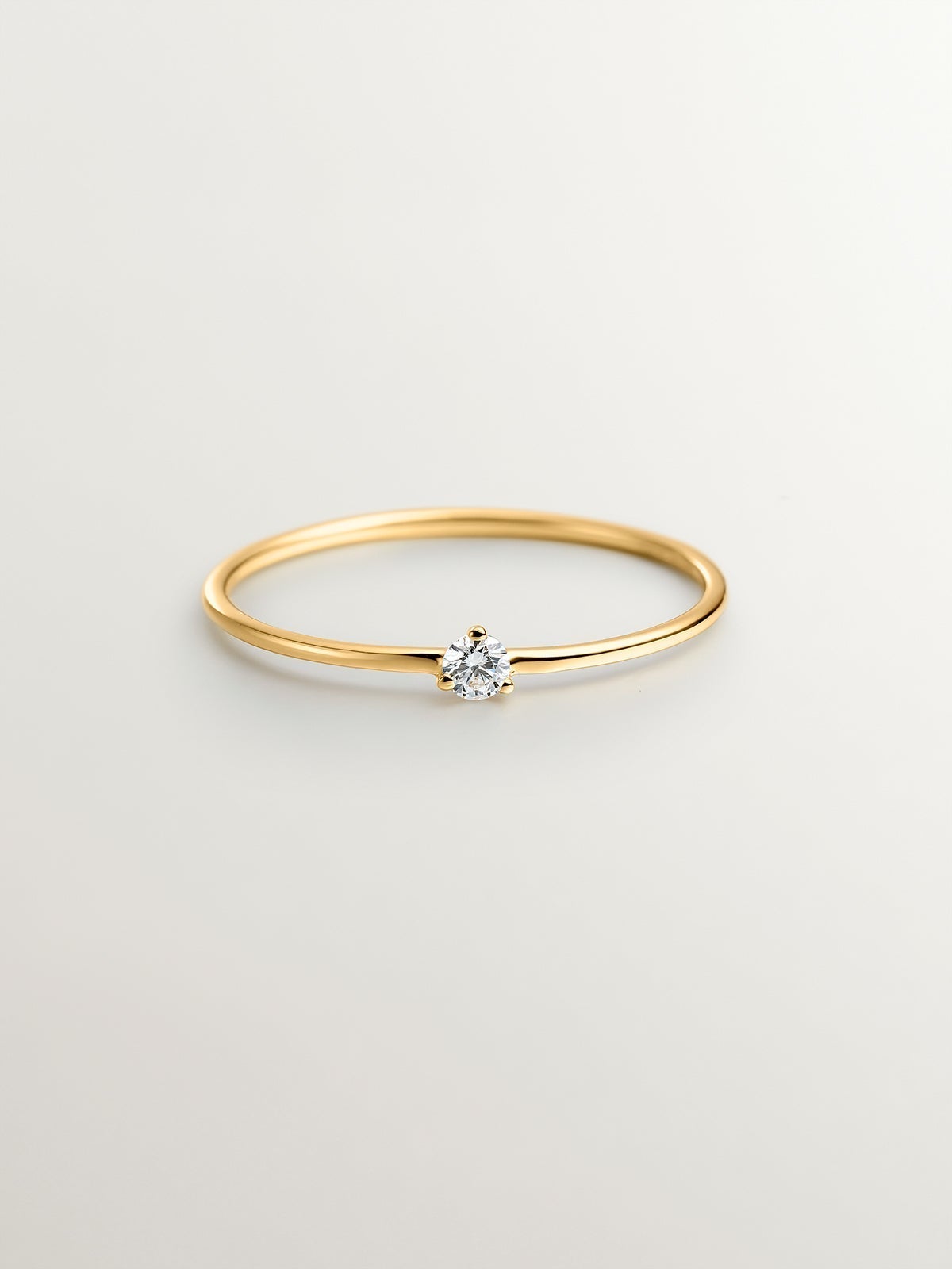 18K yellow gold solitaire ring with 0.048cts ISI2 diamond