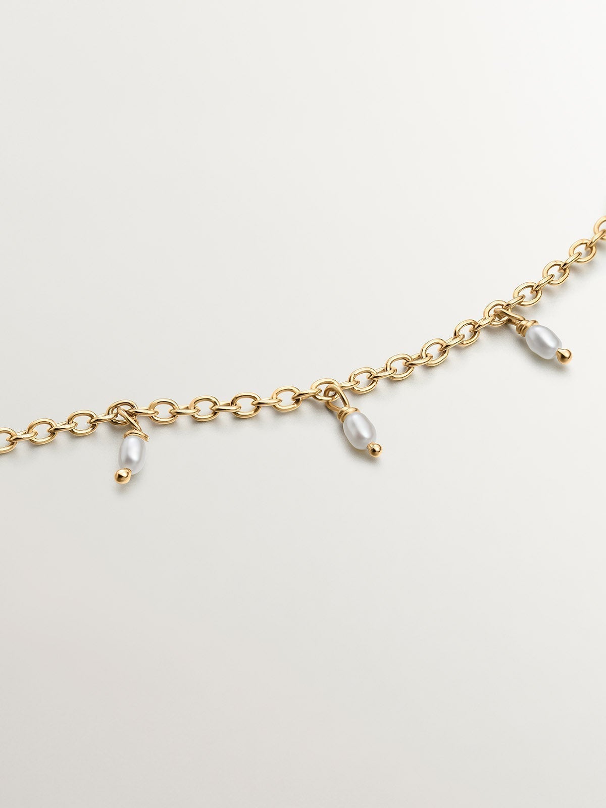 925 Silver bracelet dipped in 18K yellow gold with river pearls and water lily.