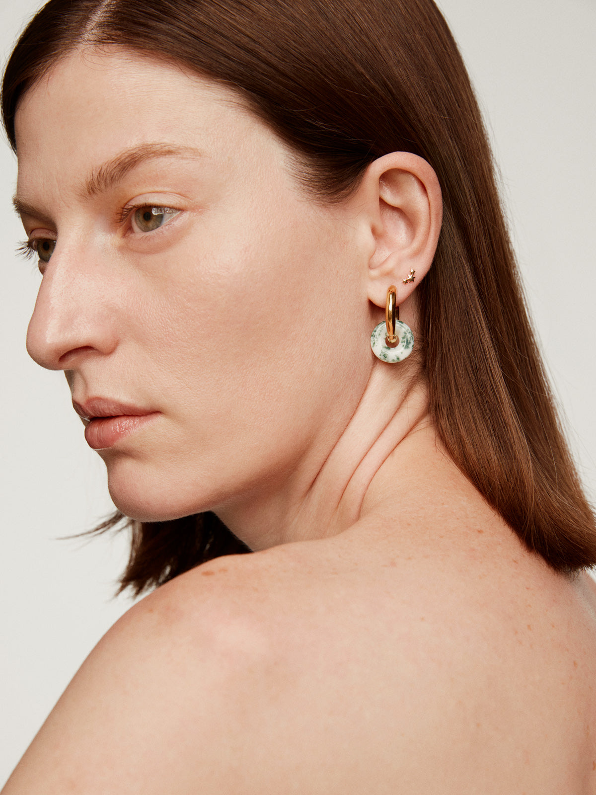 Piercing de oro amarillo de 18K con triple estrella