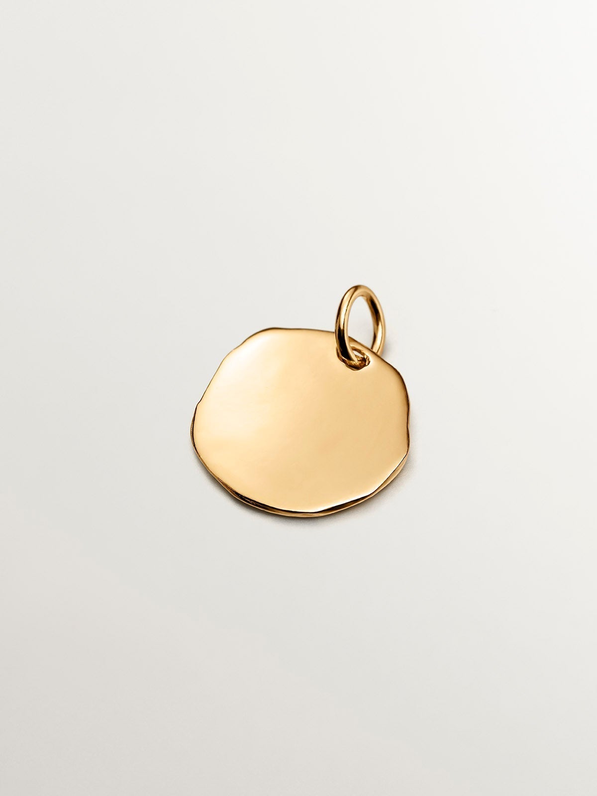Handcrafted charm made of 925 silver, plated in 18K yellow gold with the initial C.