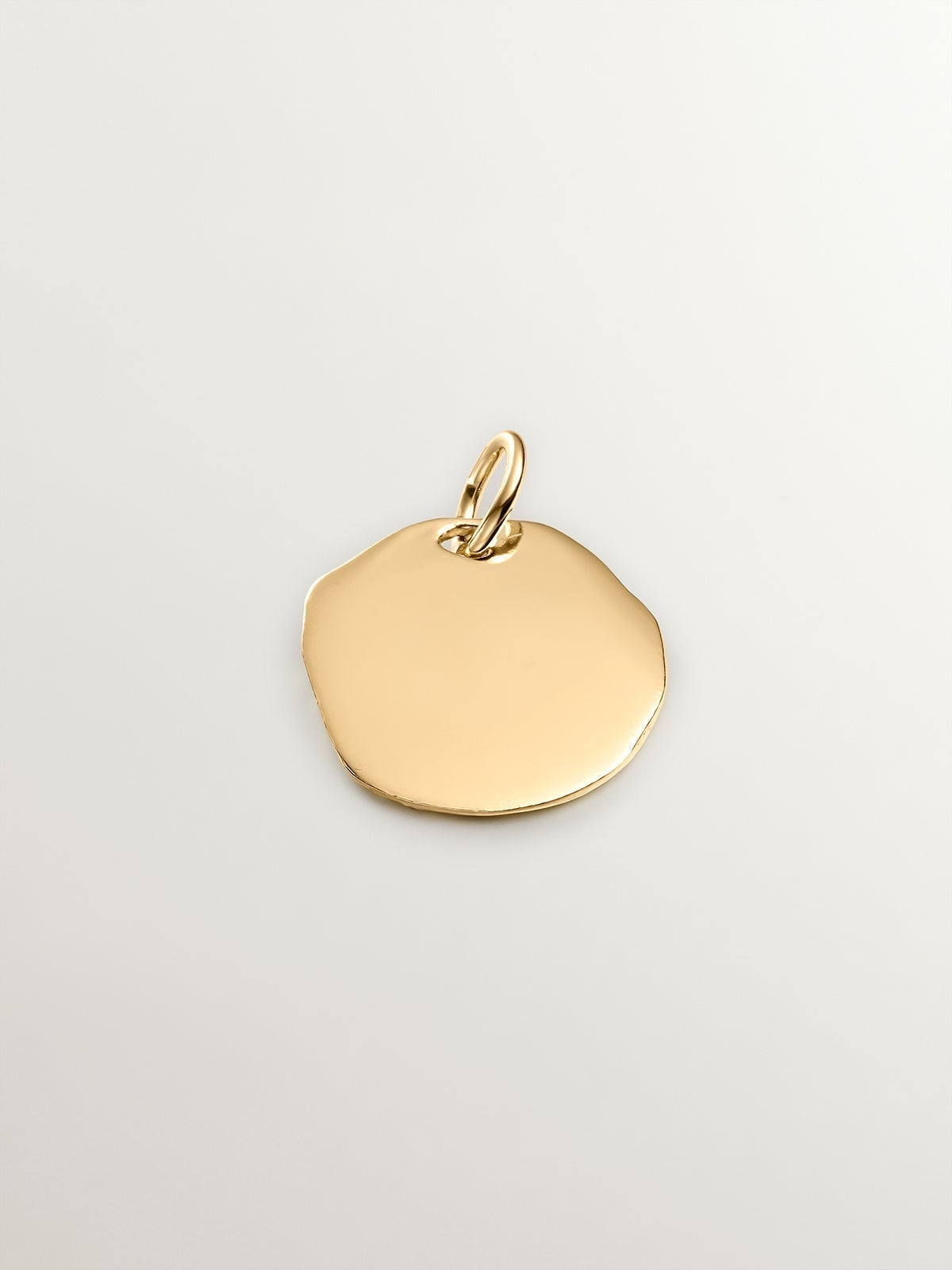 Handcrafted 925 silver charm bathed in 18K yellow gold with the initial E.