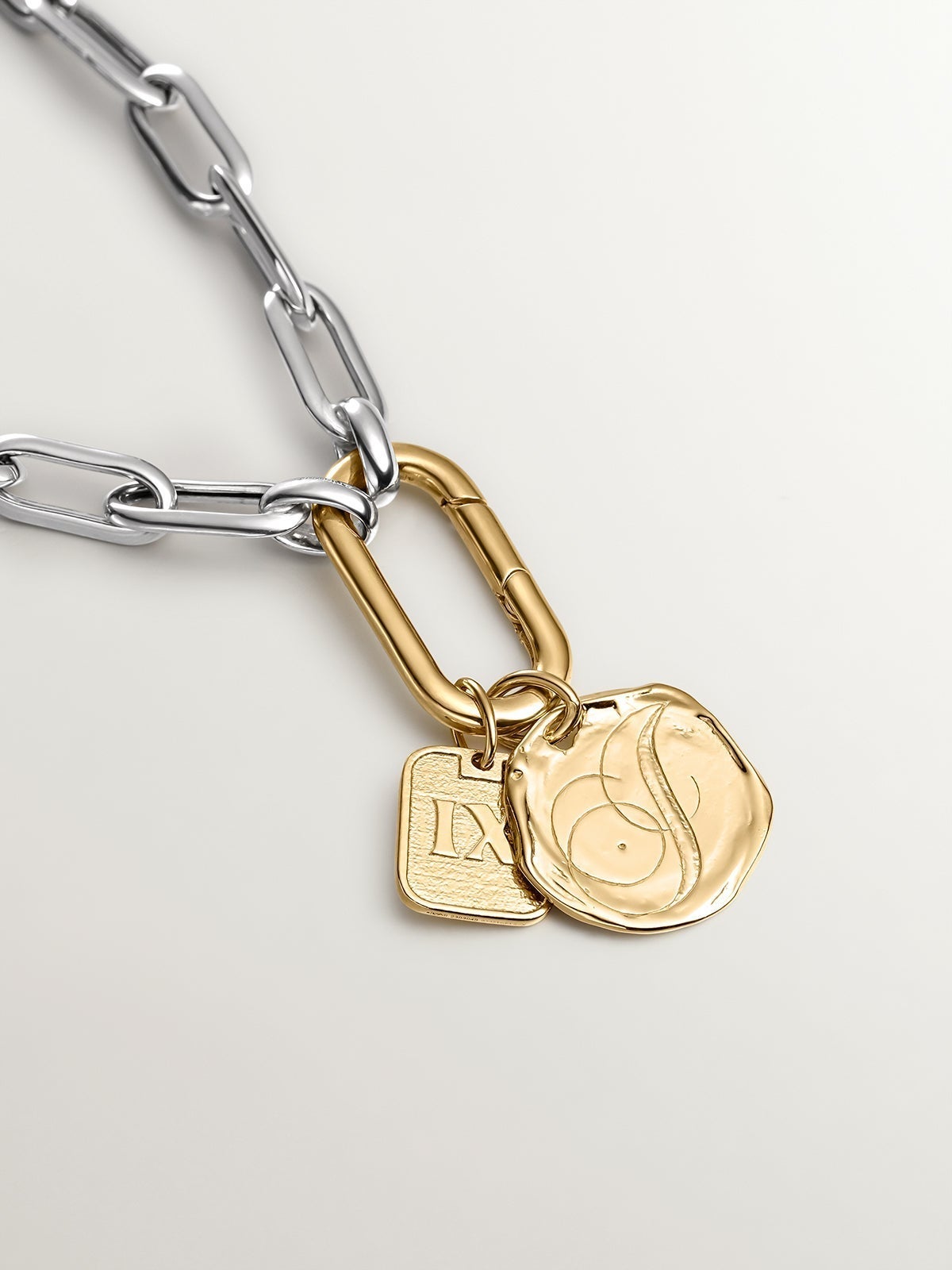 Handcrafted charm made of 925 silver, coated in 18K yellow gold with the initial I.