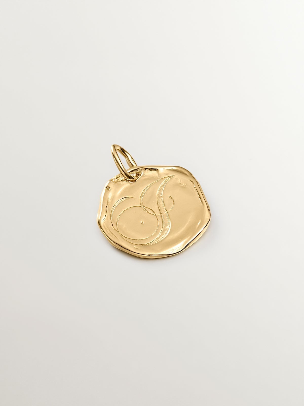 Handcrafted charm made of 925 silver, bathed in 18K yellow gold with initial J.