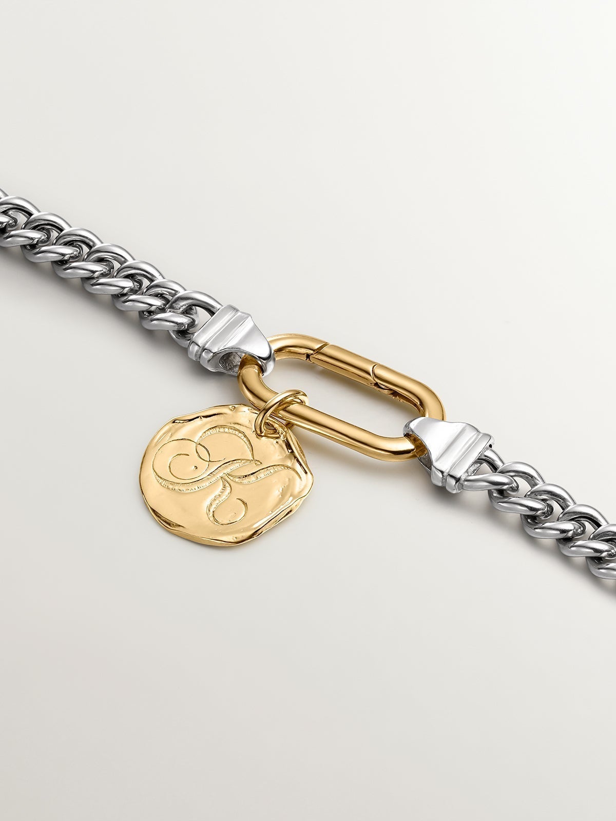 Handcrafted 925 silver charm, bathed in 18K yellow gold with initial K.