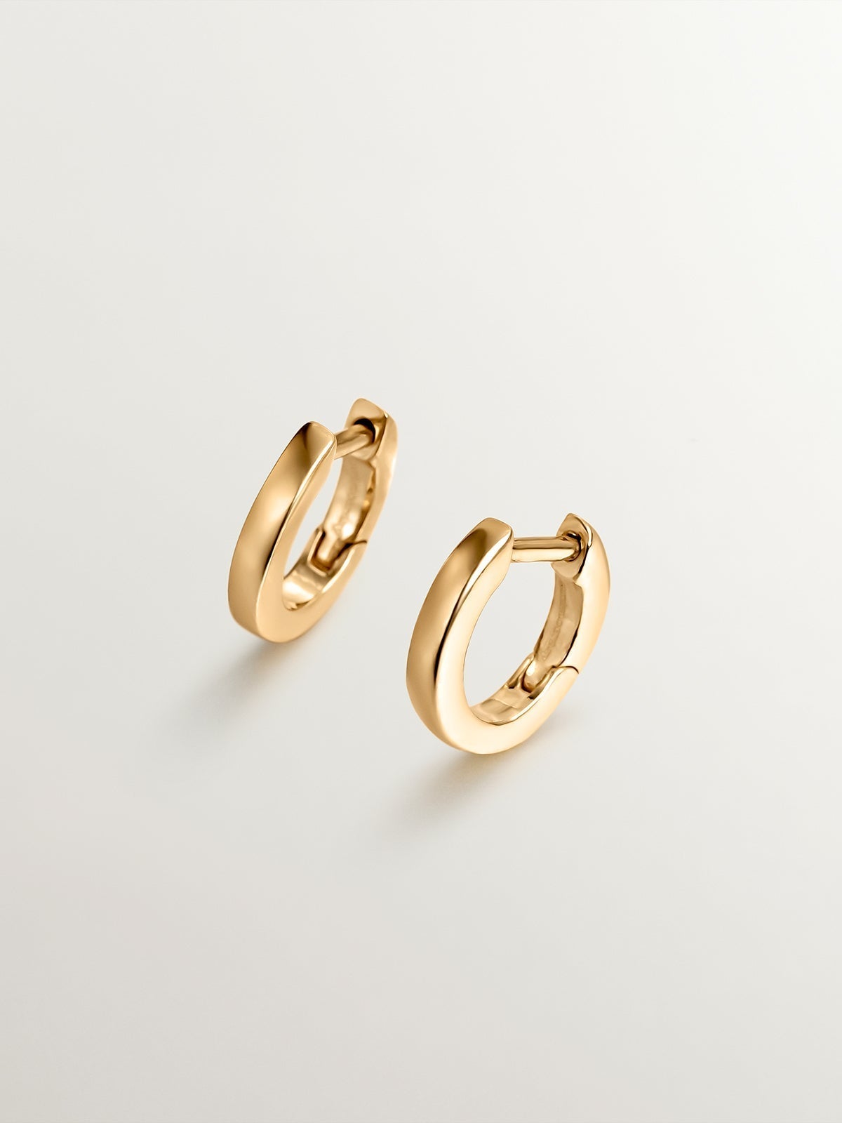 Small hoop earrings made of 925 silver, bathed in 18K yellow gold