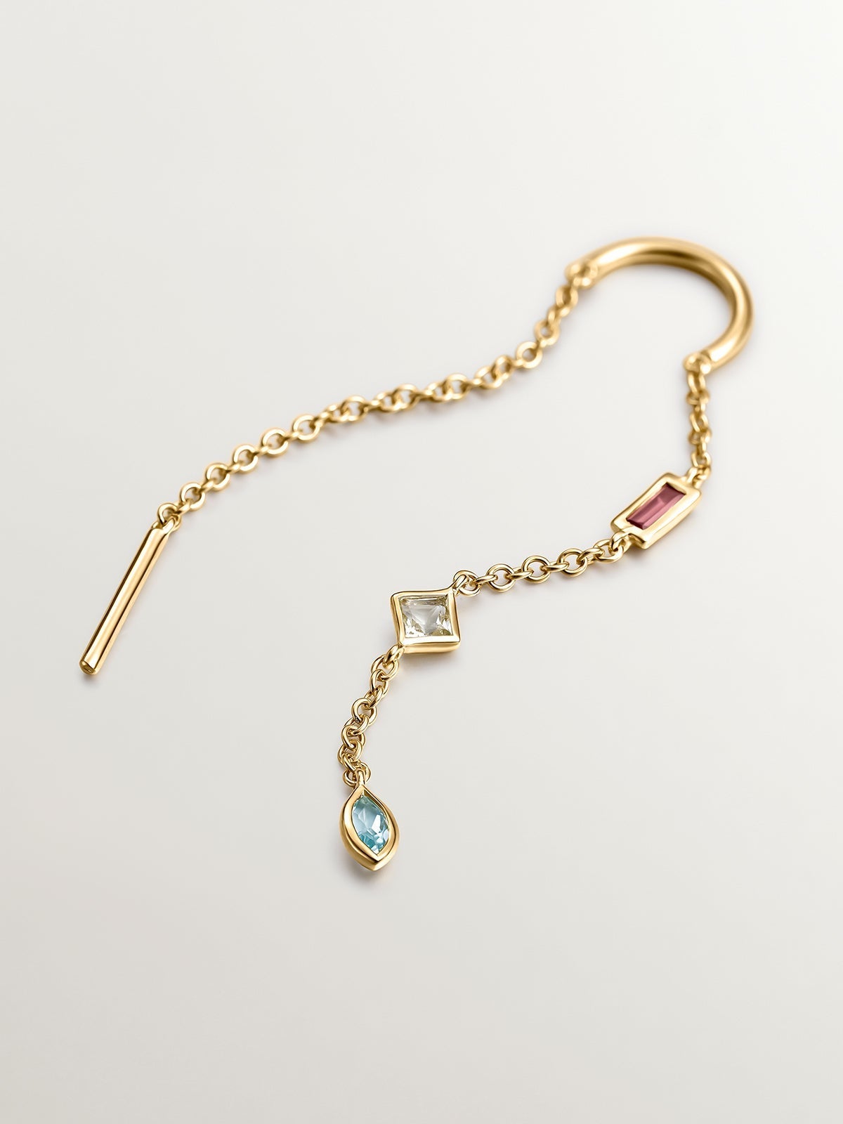 Individual earring made of 925 silver, bathed in 18K yellow gold with rhodolite, quartz and topaz.