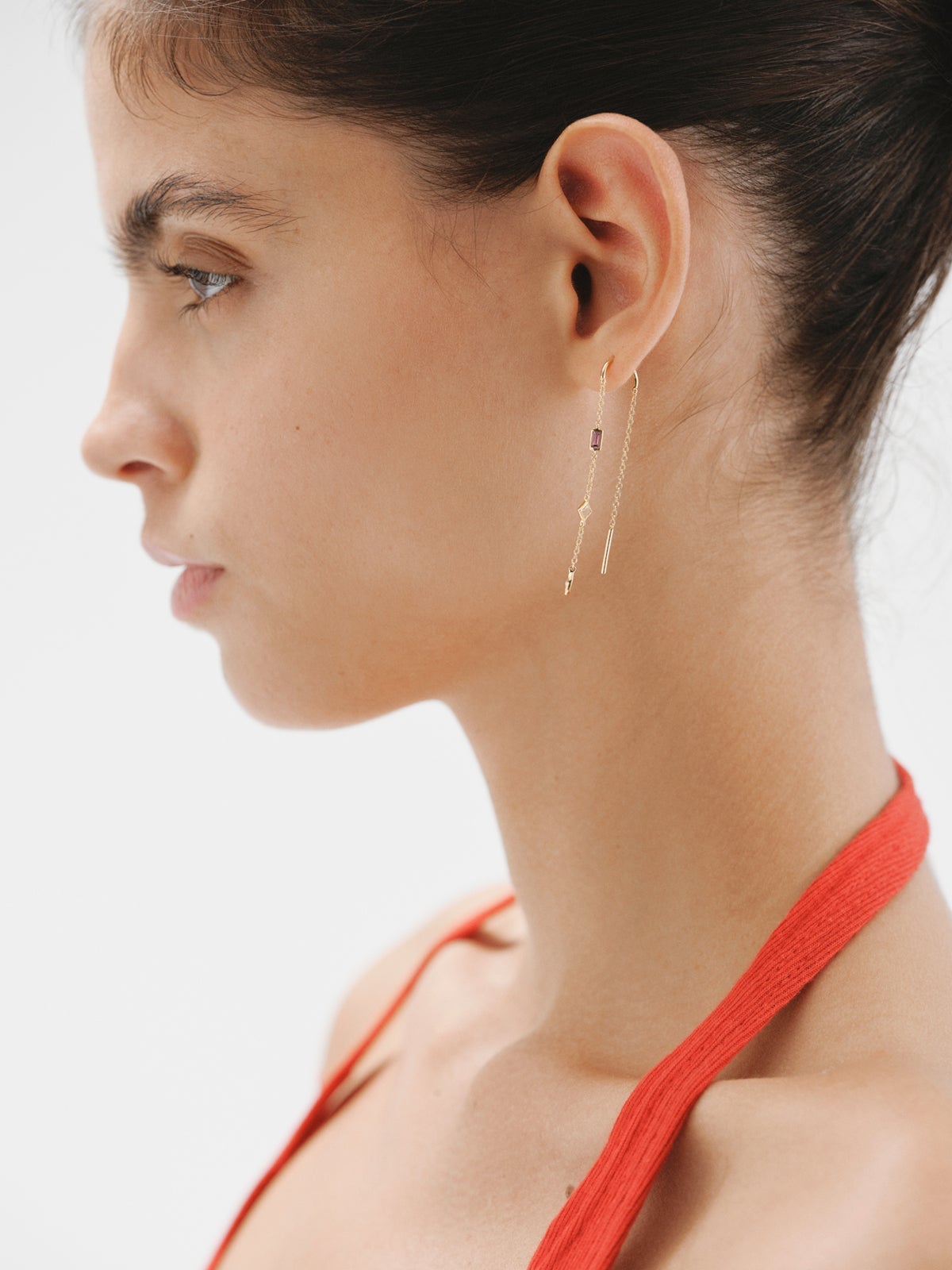 Individual earring made of 925 silver, bathed in 18K yellow gold with rhodolite, quartz and topaz.