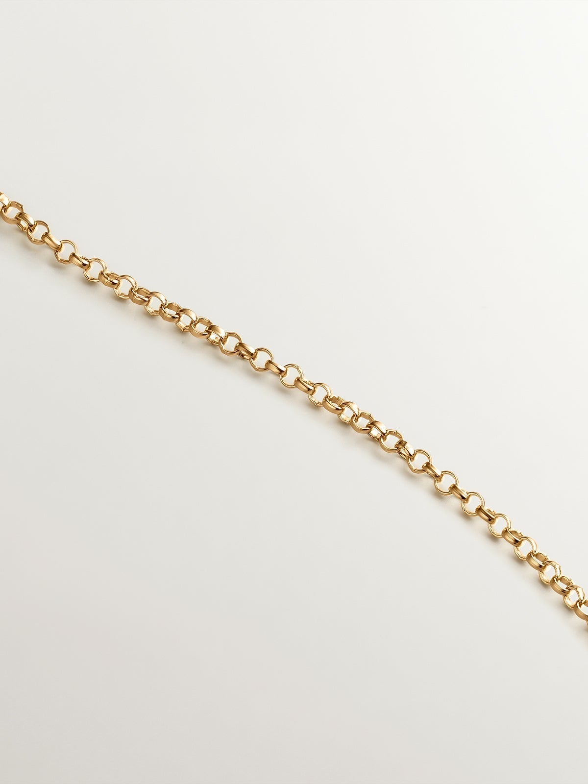 925 Silver pendant bathed in 18K yellow gold with sky blue topaz.