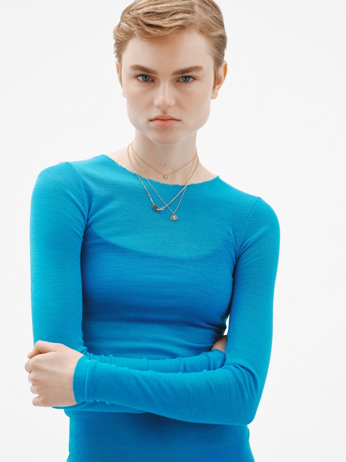 925 Silver pendant bathed in 18K yellow gold with sky blue topaz.