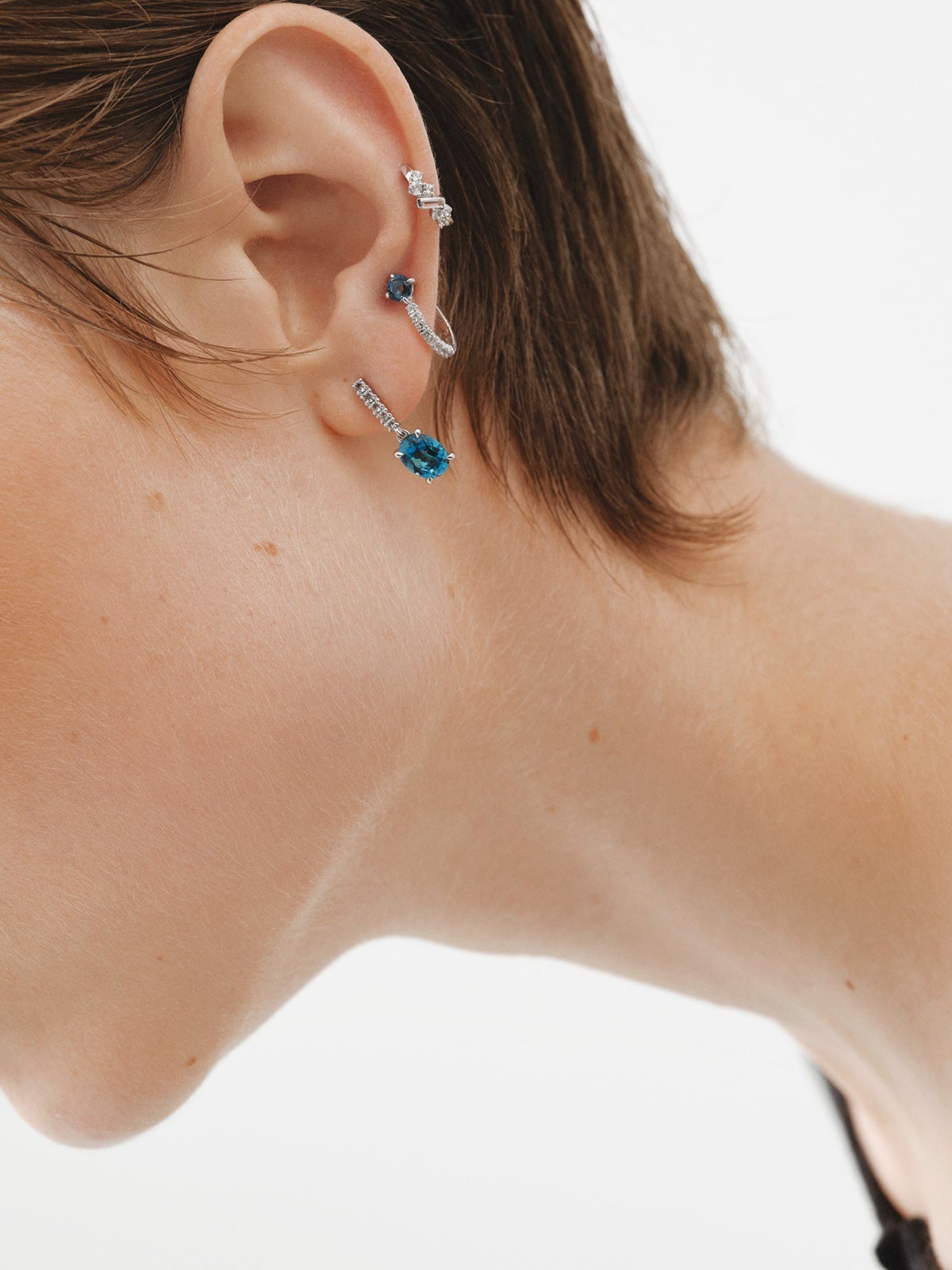 925 Silver hoop earrings with blue and white topaz.