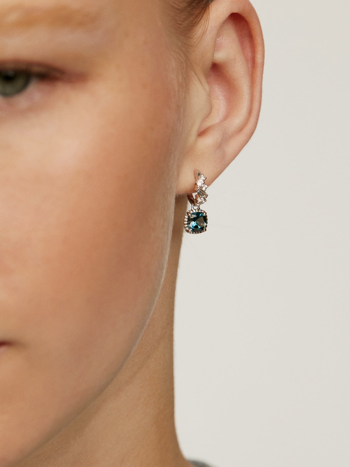 925 Silver hoop earrings with London blue and white topazes.