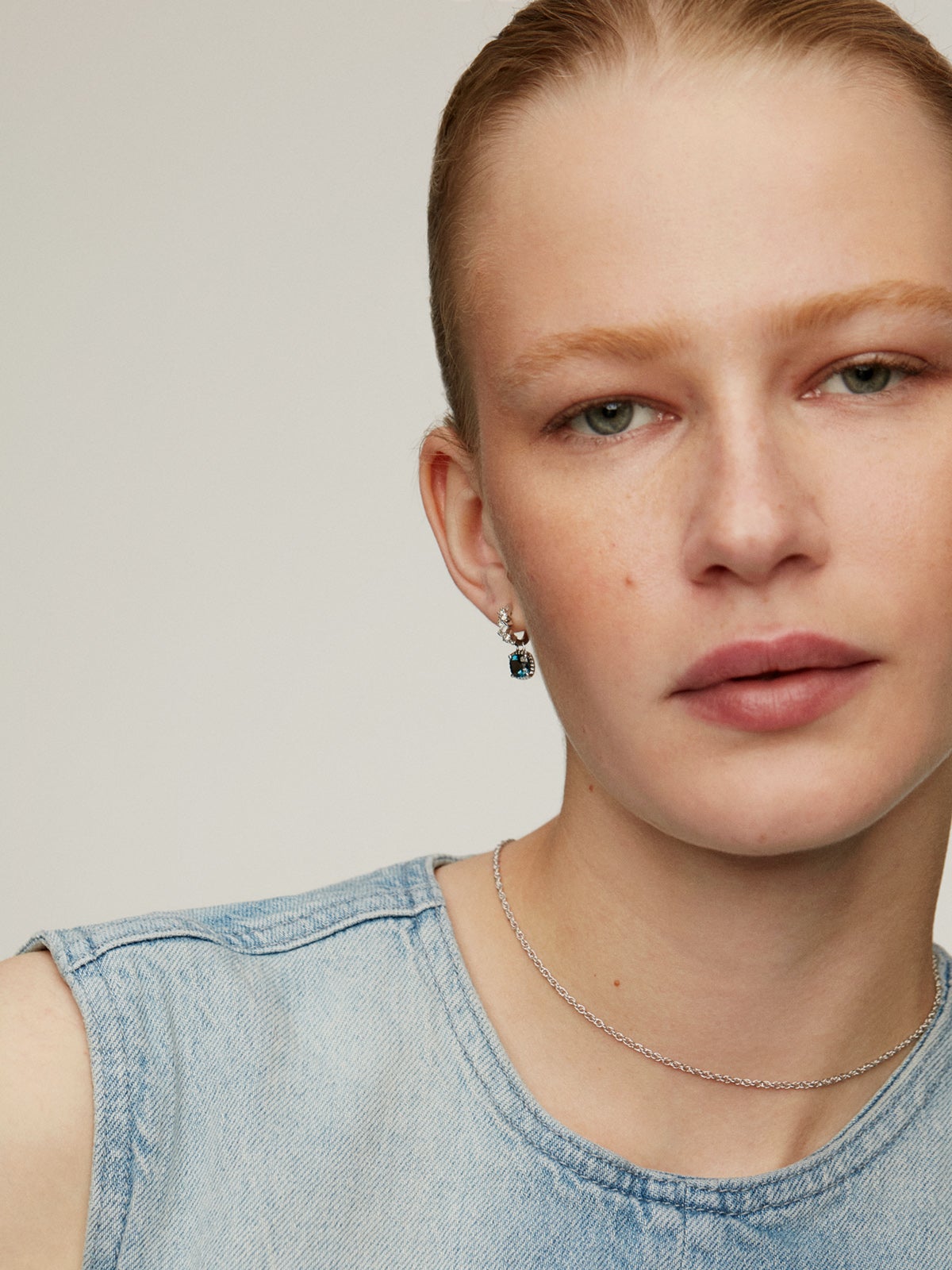 925 Silver hoop earrings with London blue and white topazes.