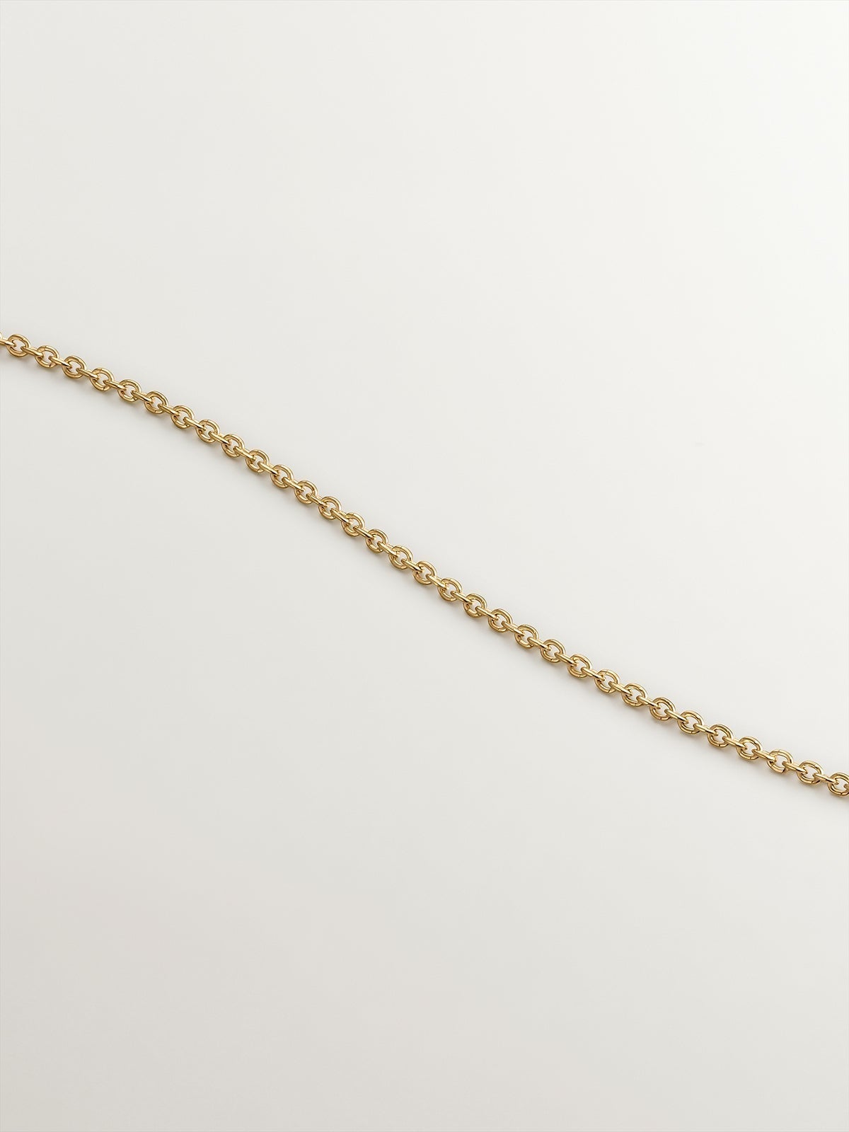 925 silver necklace bathed in 18K yellow gold with white topaz stones