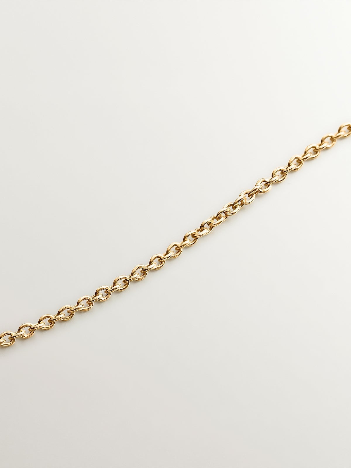 925 Silver necklace coated in 18K yellow gold with rhodolites and topazes.