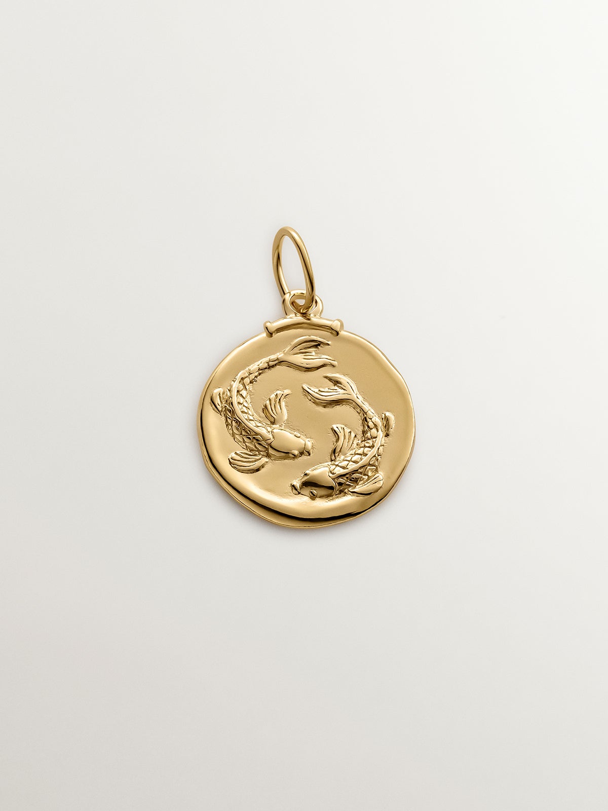 Pisces Charm made from 925 silver bathed in 18K yellow gold.