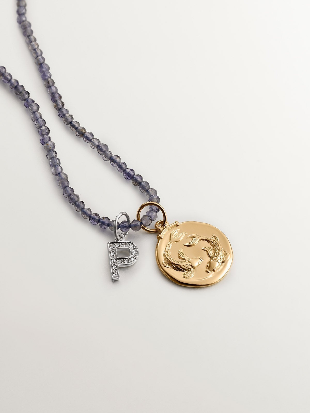 Pisces Charm made from 925 silver bathed in 18K yellow gold.