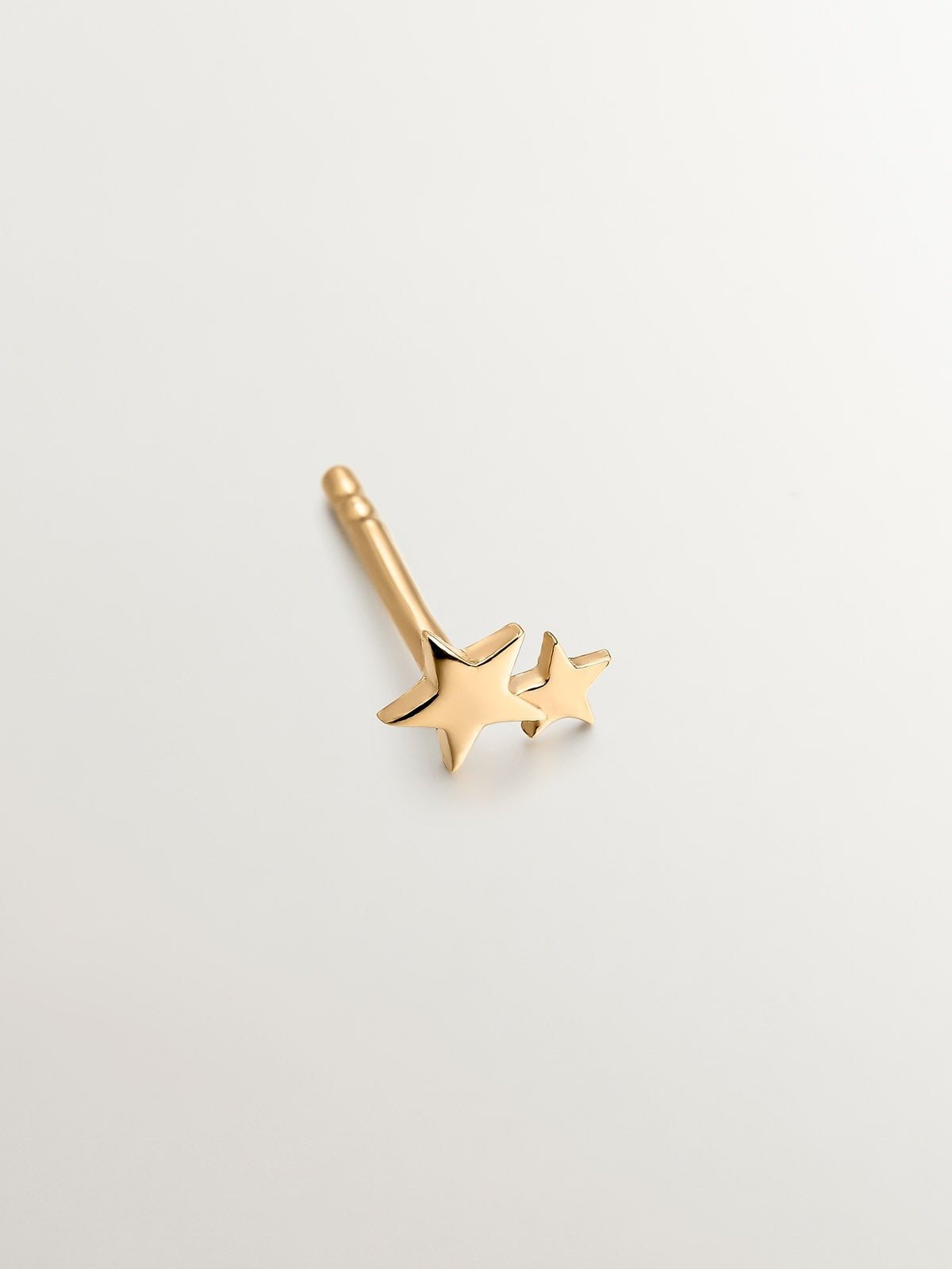 Individual small earring made of 925 silver bathed in 18K yellow gold with stars