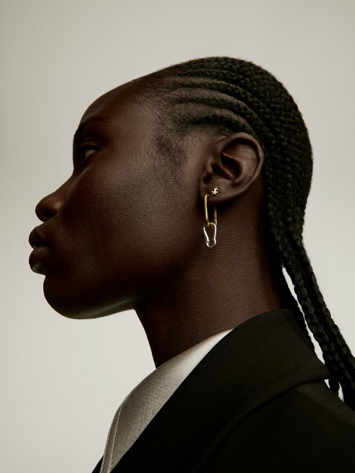 Individual small earring made of 925 silver bathed in 18K yellow gold with stars