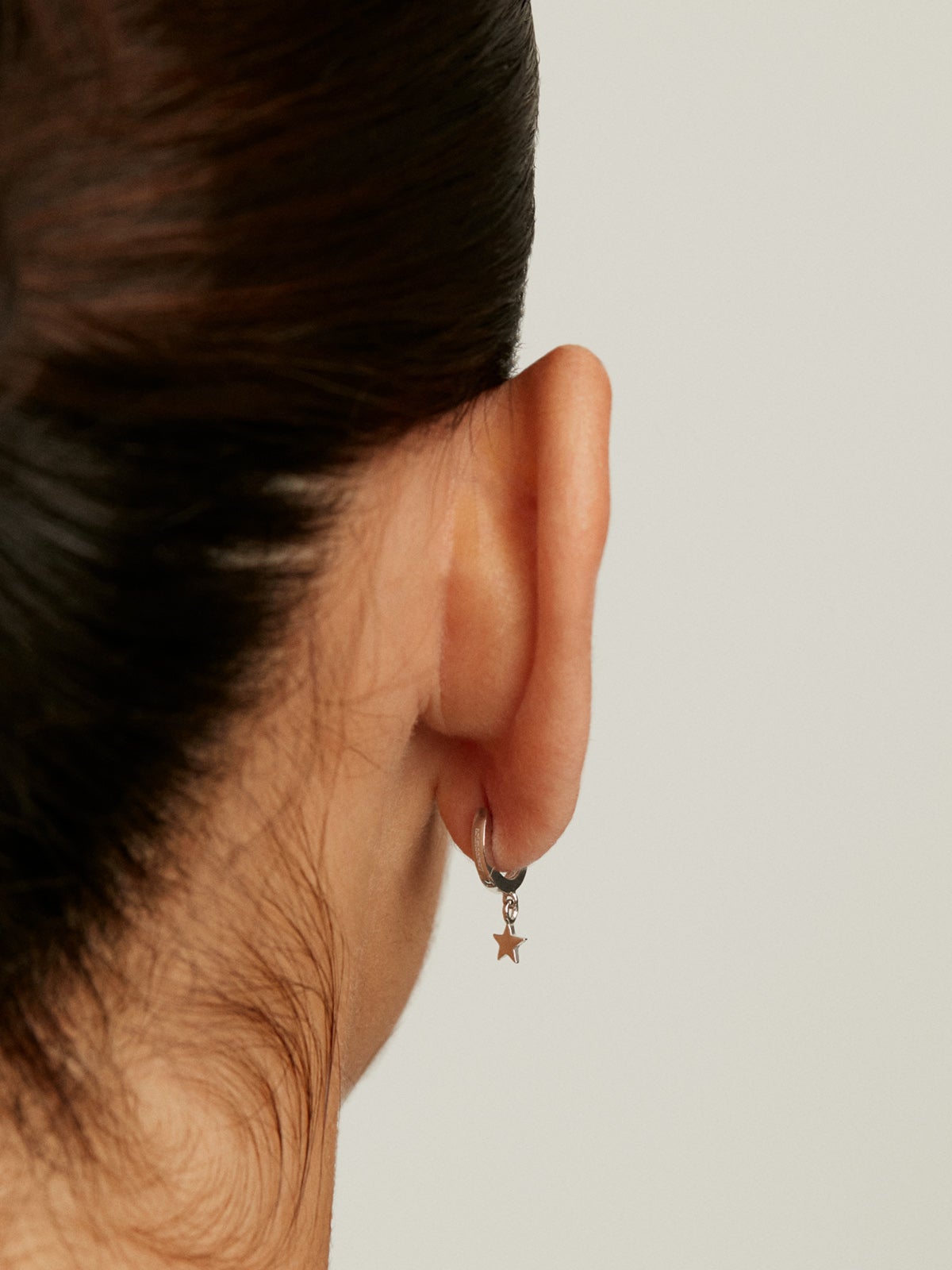 Small 925 silver hoop earrings with star.
