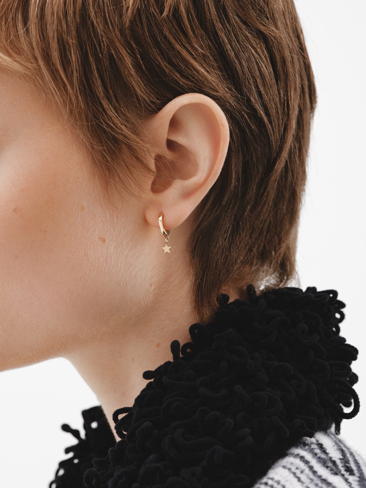 Small hoop earrings made of 925 silver, bathed in 18K yellow gold with star.