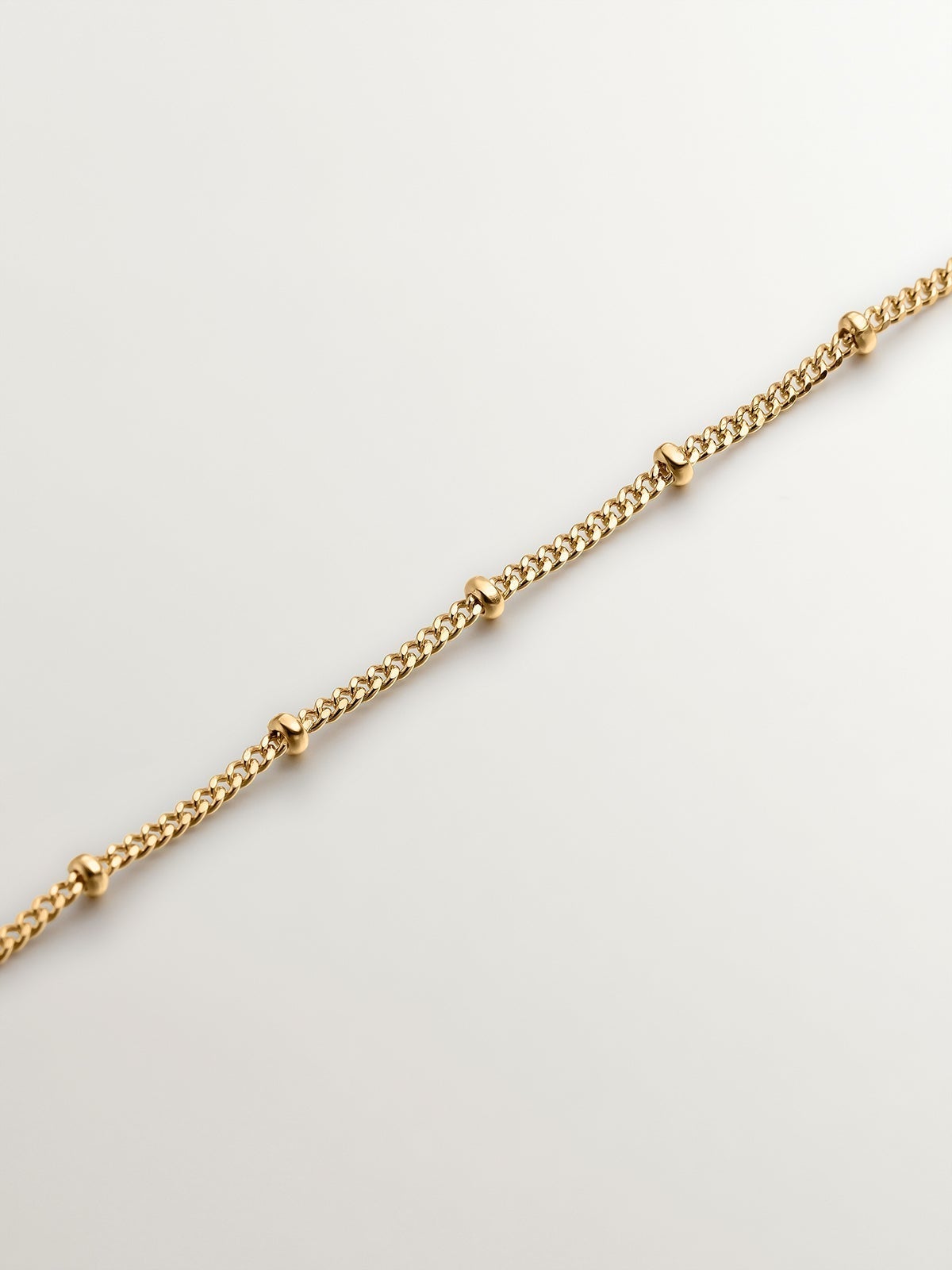 925 Silver necklace coated in 18K yellow gold with stars and moons.