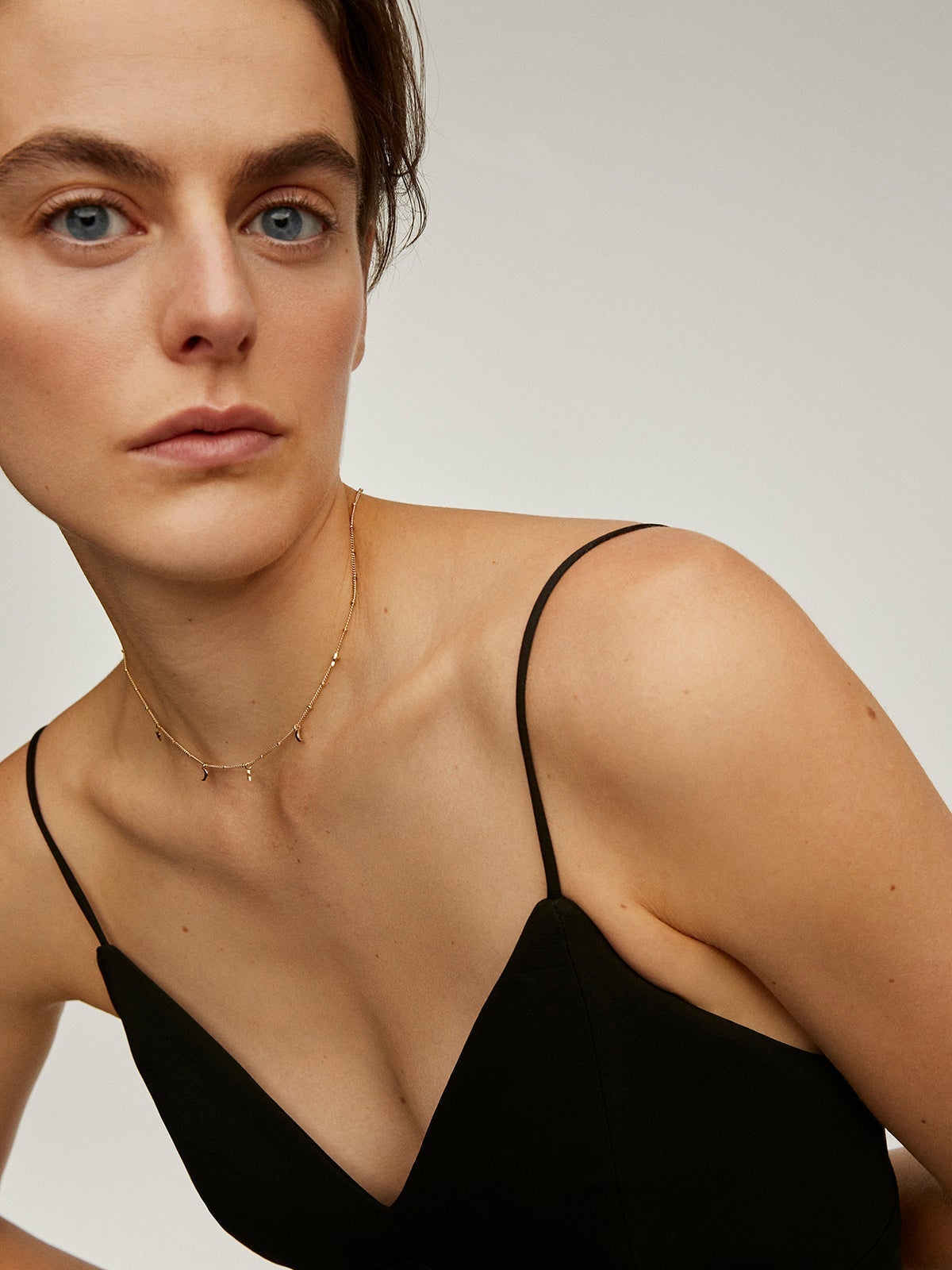 925 Silver necklace coated in 18K yellow gold with stars and moons.