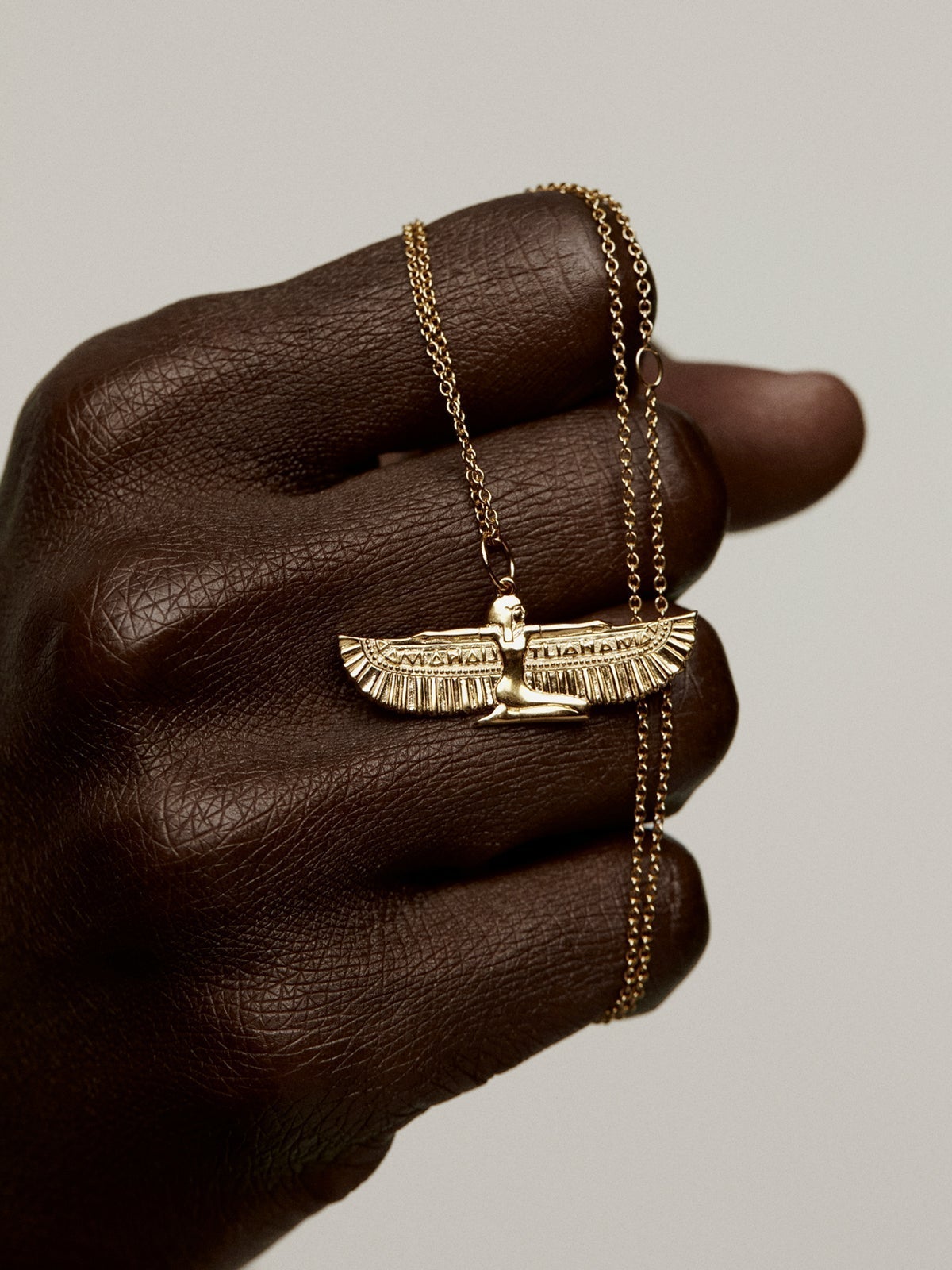 925 silver charm coated in 18K yellow gold with winged goddess