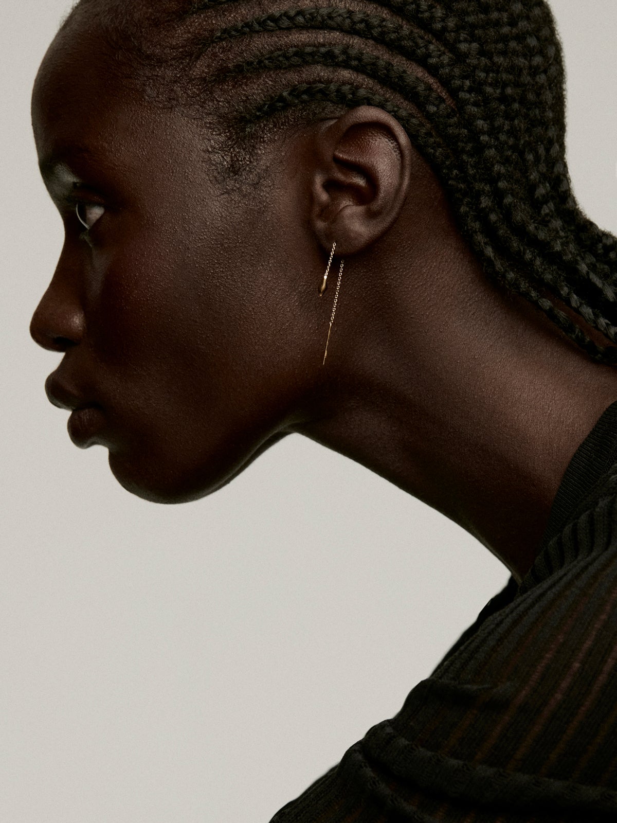 Individual 925 silver earring bathed in 18K yellow gold with a snake head.