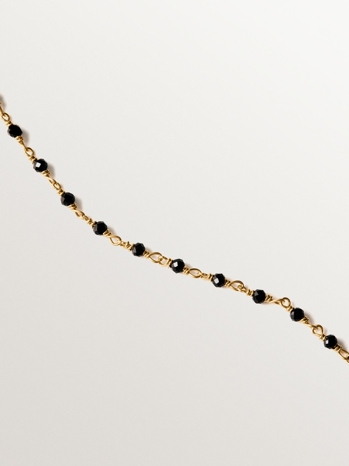 925 silver chain plated in 18K yellow gold with black spinels