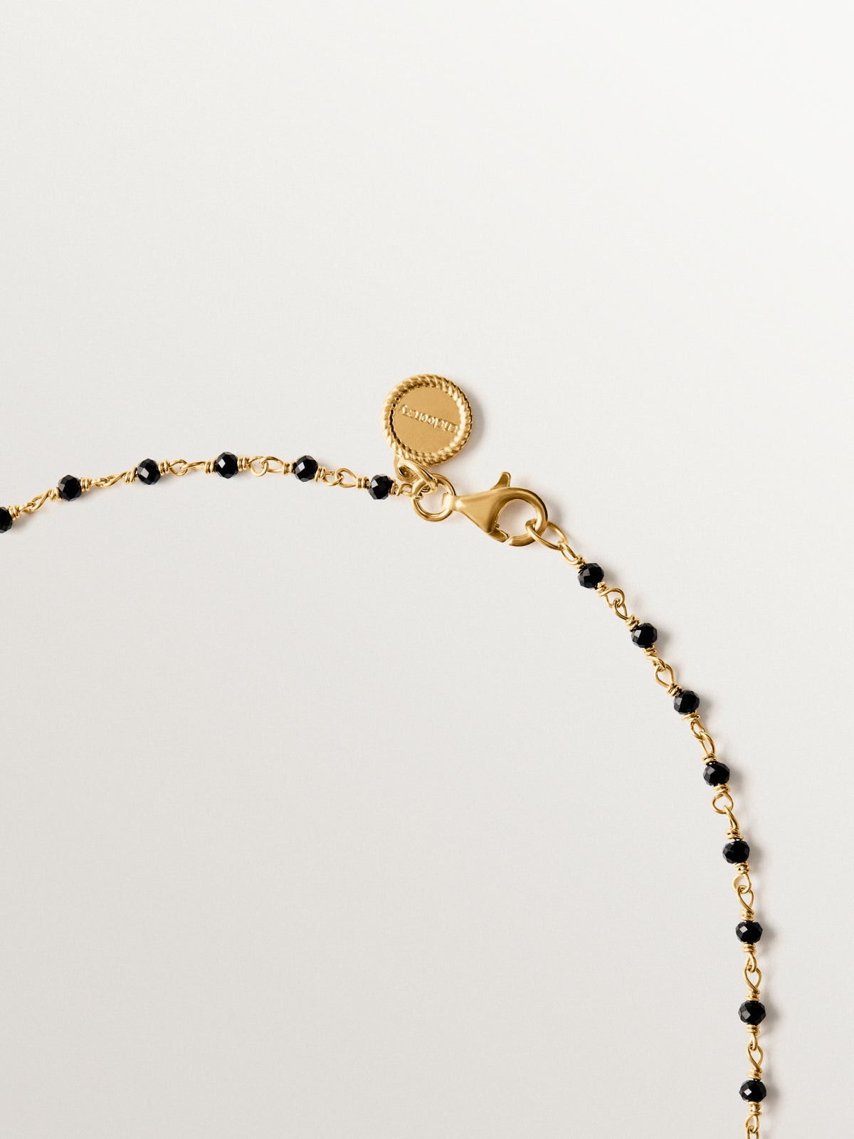 925 silver chain plated in 18K yellow gold with black spinels