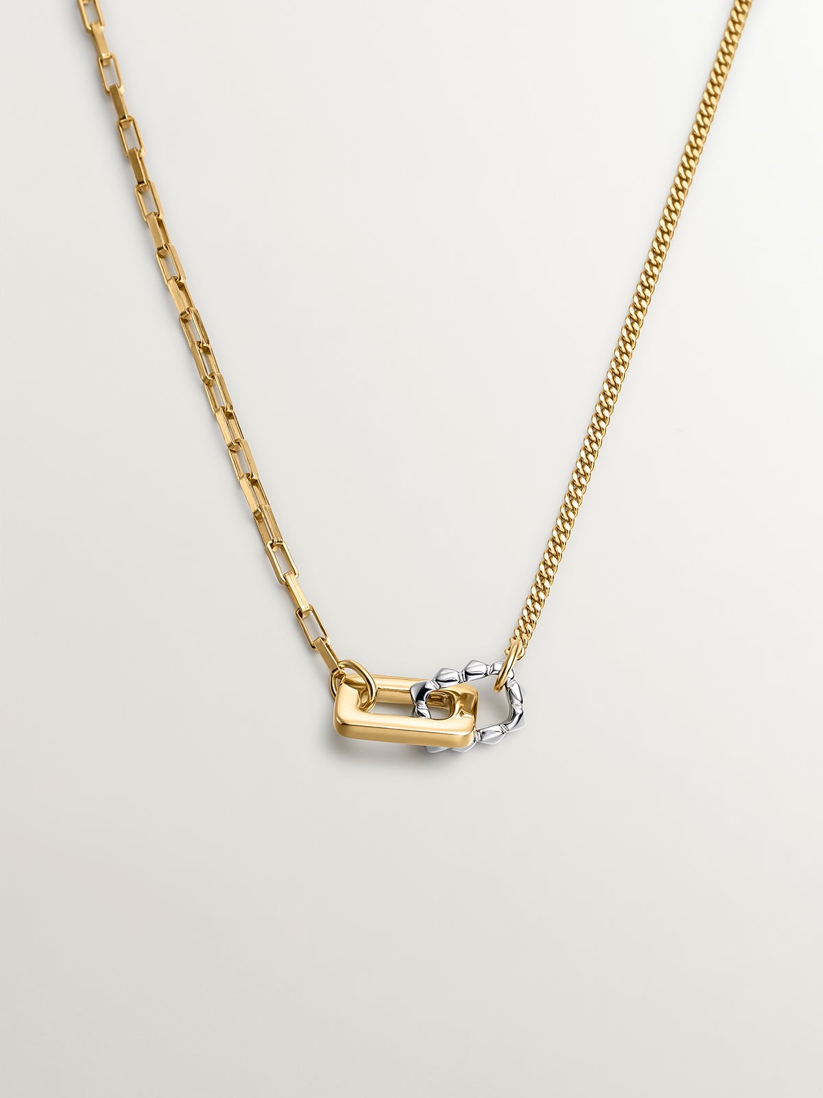 Two-tone pendant in 925 silver and 925 silver plated in 18K yellow gold with geometric shapes